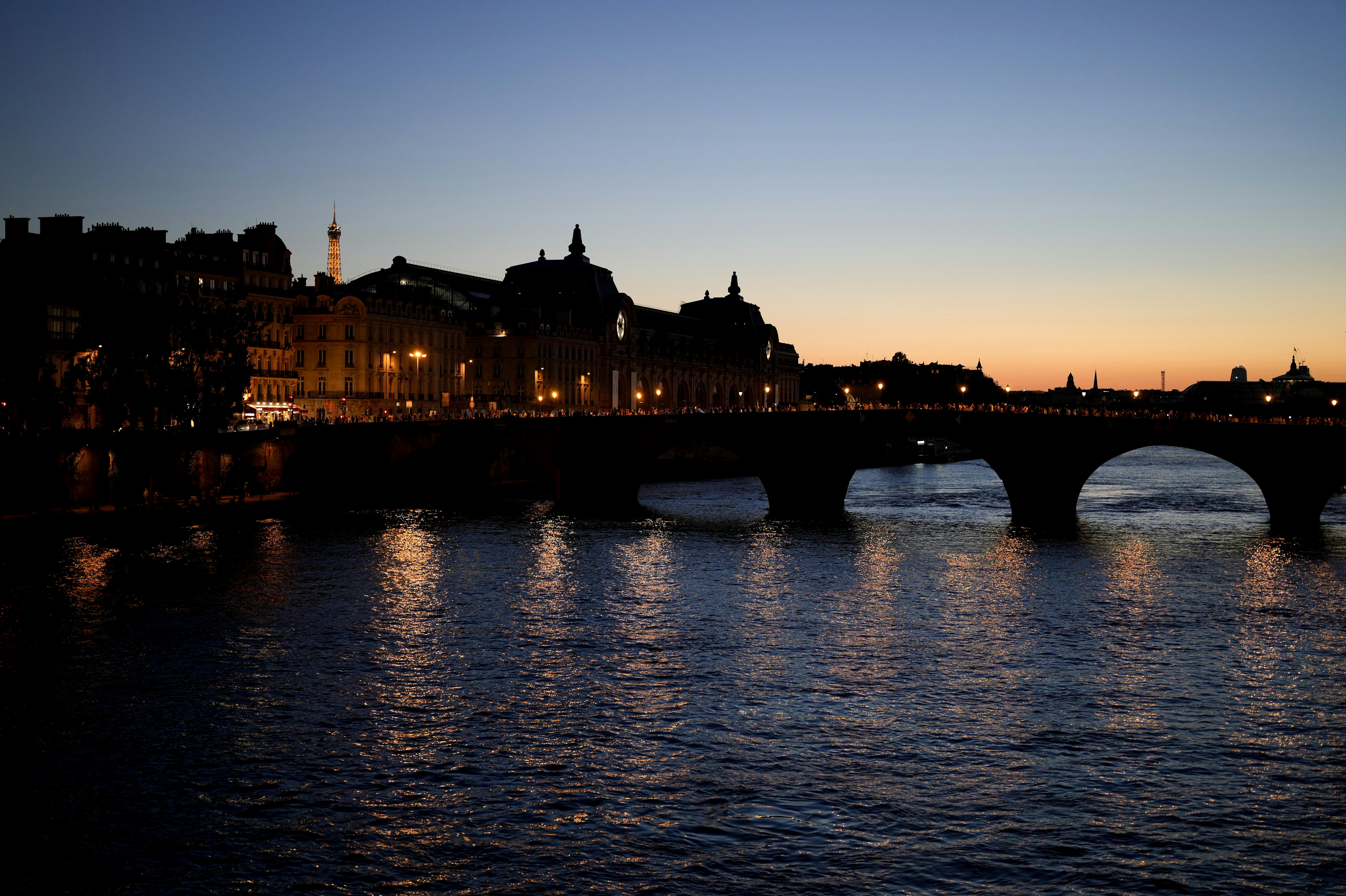 A view of the Seine River is pictured at sunset during the 2024 Summer Olympics, Monday, Aug. 5, 2024, in Paris, France. (AP Photo/Natacha Pisarenko)