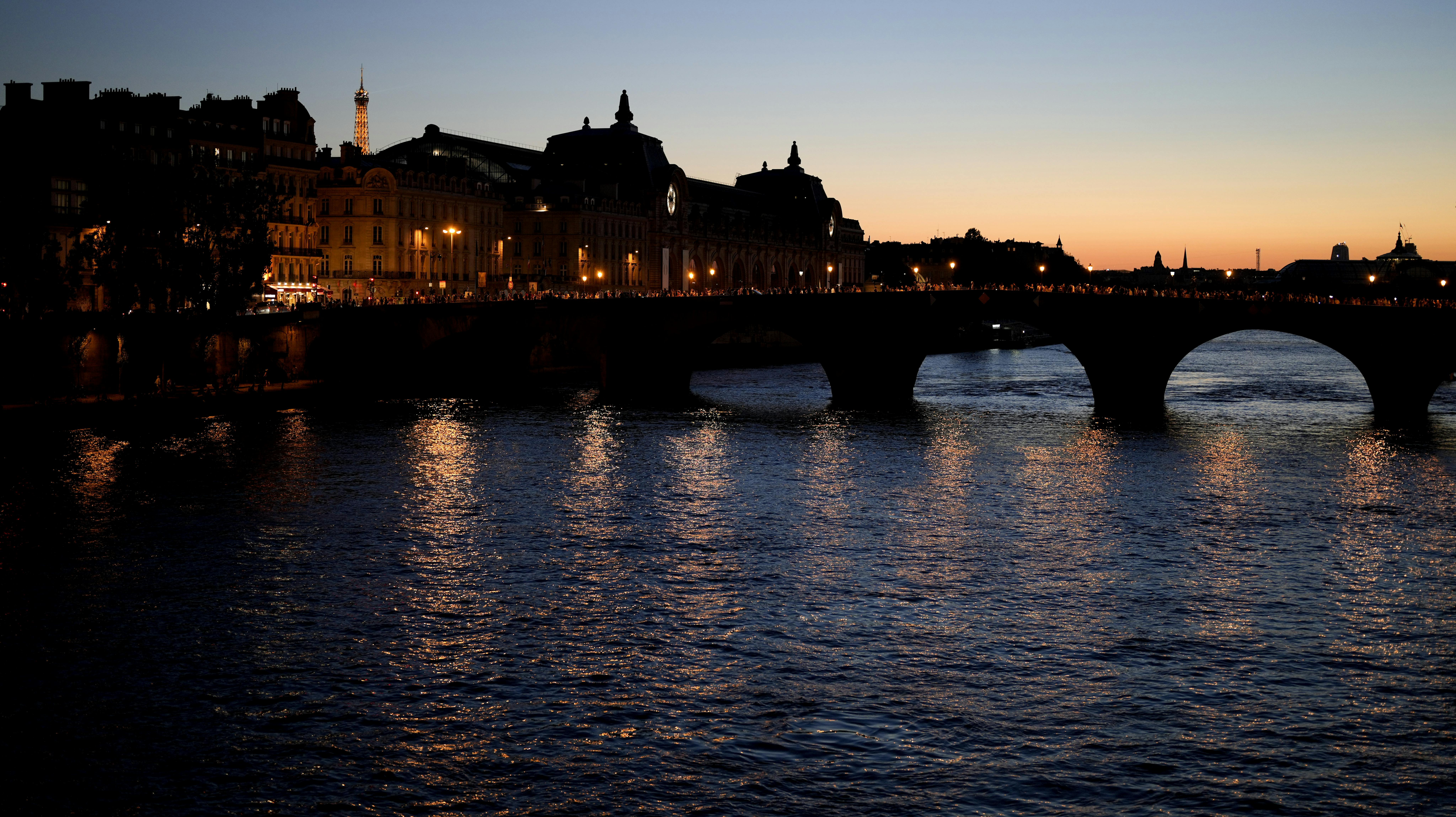 A view of the Seine River is pictured at sunset during the 2024 Summer Olympics, Monday, Aug. 5, 2024, in Paris, France. (AP Photo/Natacha Pisarenko)