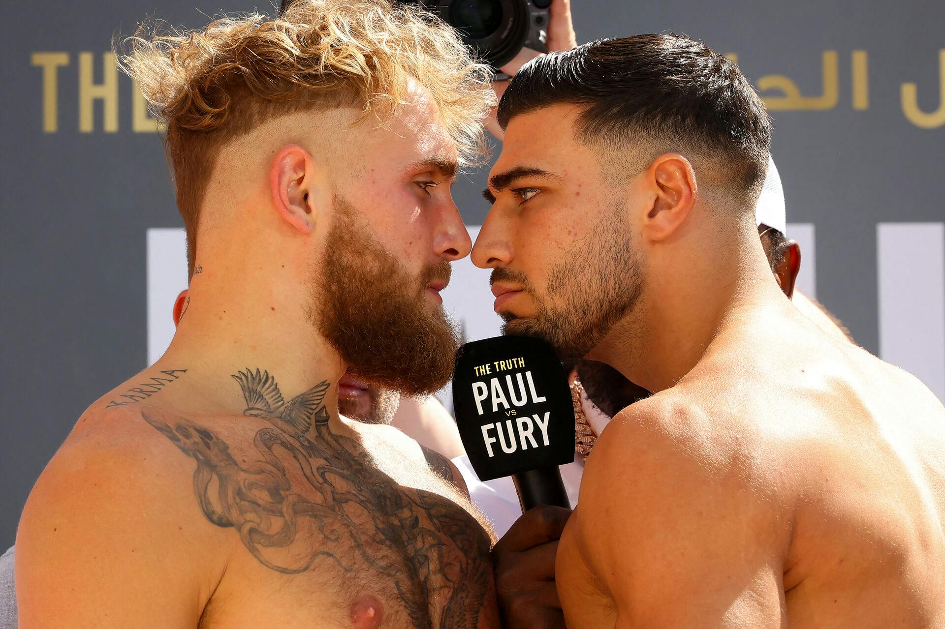 Boxers Tommy Fury (R) and Jake Paul face off during the weigh-in event, a day before their match in Riyadh, on February 25, 2023. Fayez Nureldine / AFP