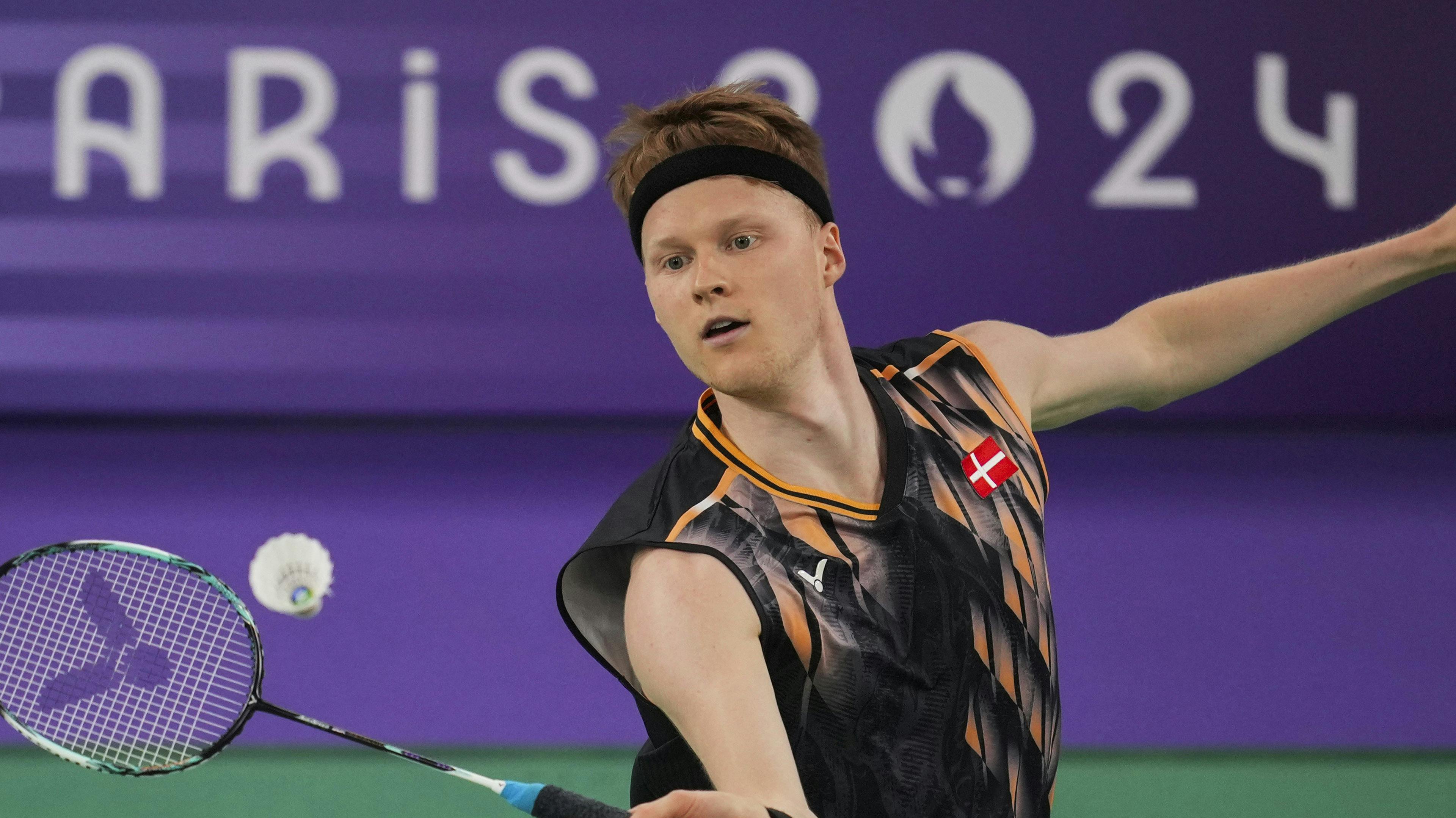 Denmark's Anders Antonsen plays against Malaysia's Lee Zii Jia during their men's singles badminton quarter final match at the 2024 Summer Olympics, Friday, Aug. 2, 2024, in Paris, France. (AP Photo/Kin Cheung)