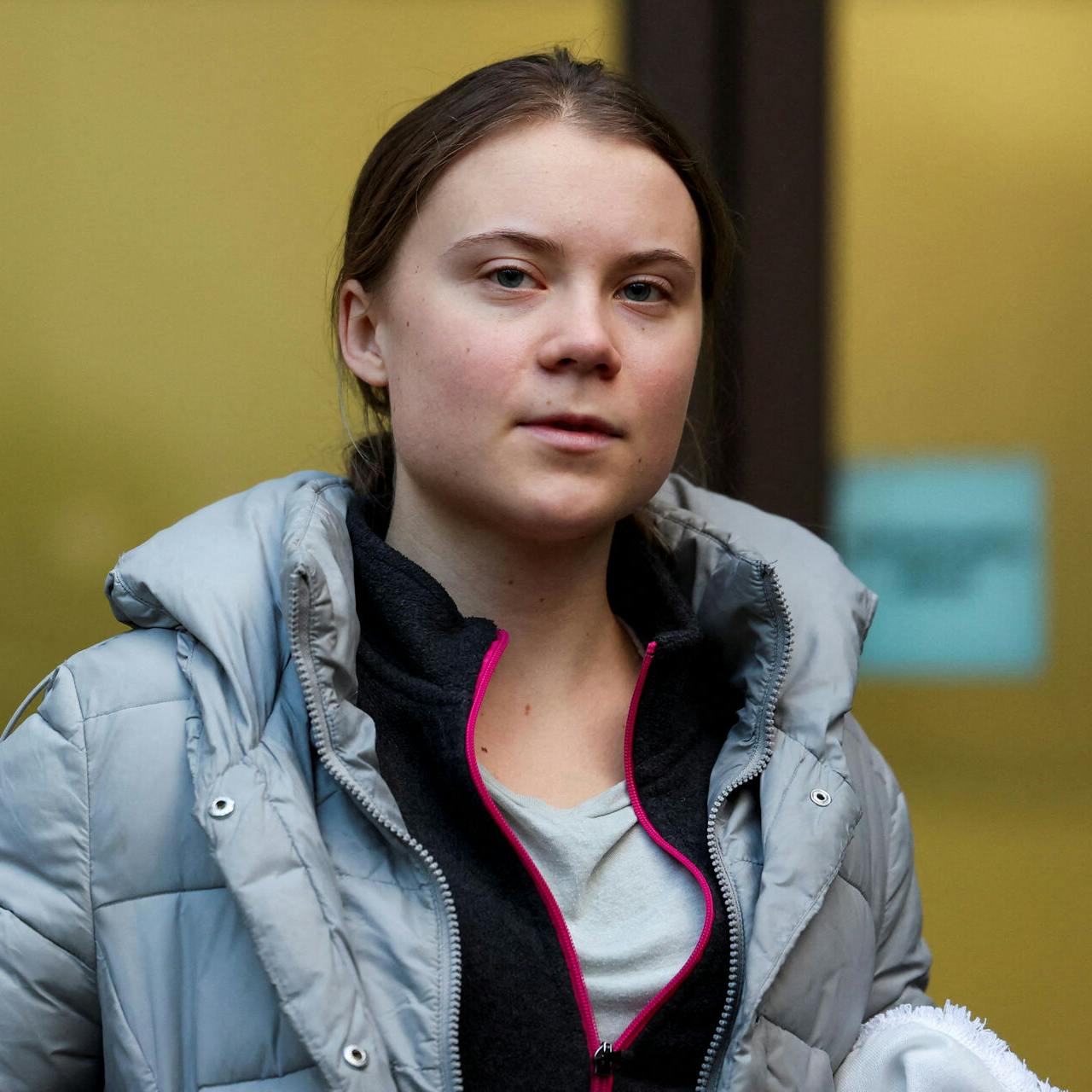 FILE PHOTO: Climate activist Greta Thunberg looks on outside Westminster Magistrates' Court, after she was cleared of a public order offence over a protest outside an oil and gas conference last year, in London, Britain, February 2, 2024. REUTERS/Isabel Infantes/File Photo