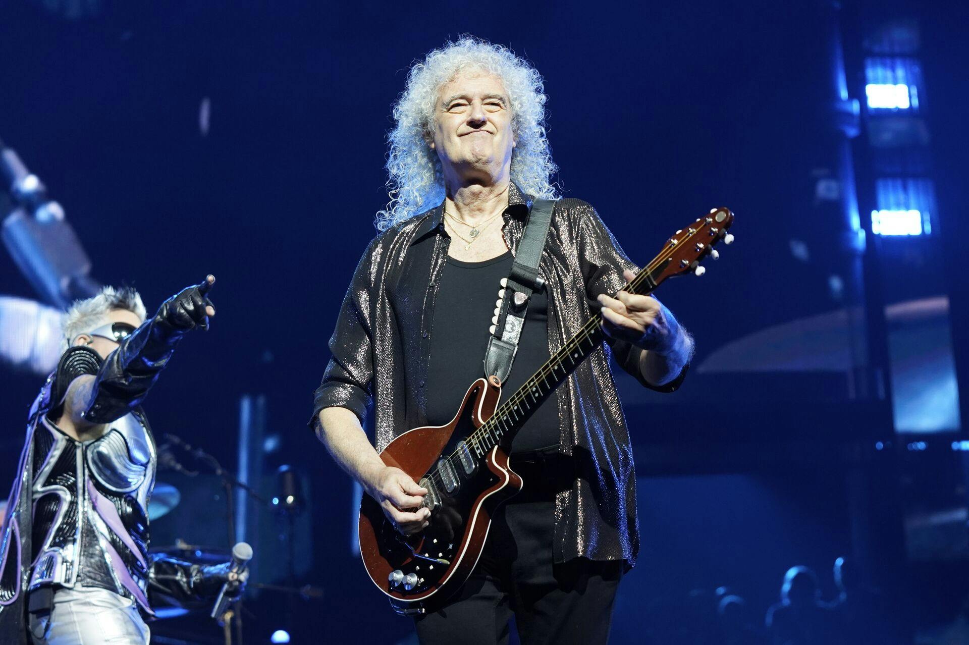 Brian May of Queen performs during the "Rhapsody" tour on Monday, OCT. 30, 2023, at the United Center in Chicago. (Photo by Rob Grabowski/Invision/AP)