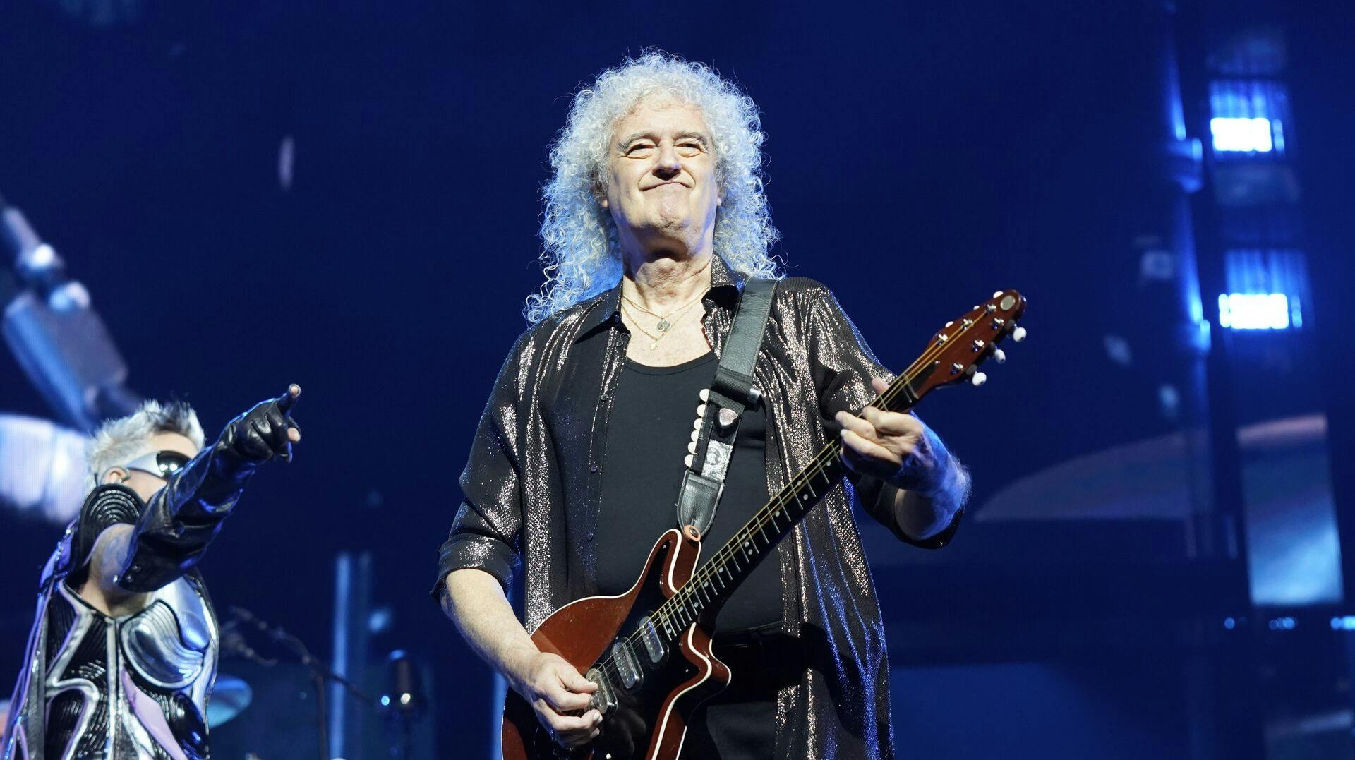 Brian May of Queen performs during the "Rhapsody" tour on Monday, OCT. 30, 2023, at the United Center in Chicago. (Photo by Rob Grabowski/Invision/AP)