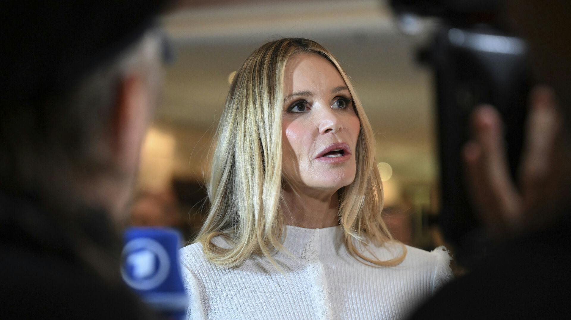 27 February 2024, Bavaria, Munich: Elle Macpherson, model and actress, stands on the white carpet at the Best Brands Awards 2024 gala, Hotel "Bayerischer Hof" and gives an interview. Photo by: Felix H'rhager/picture-alliance/dpa/AP Images