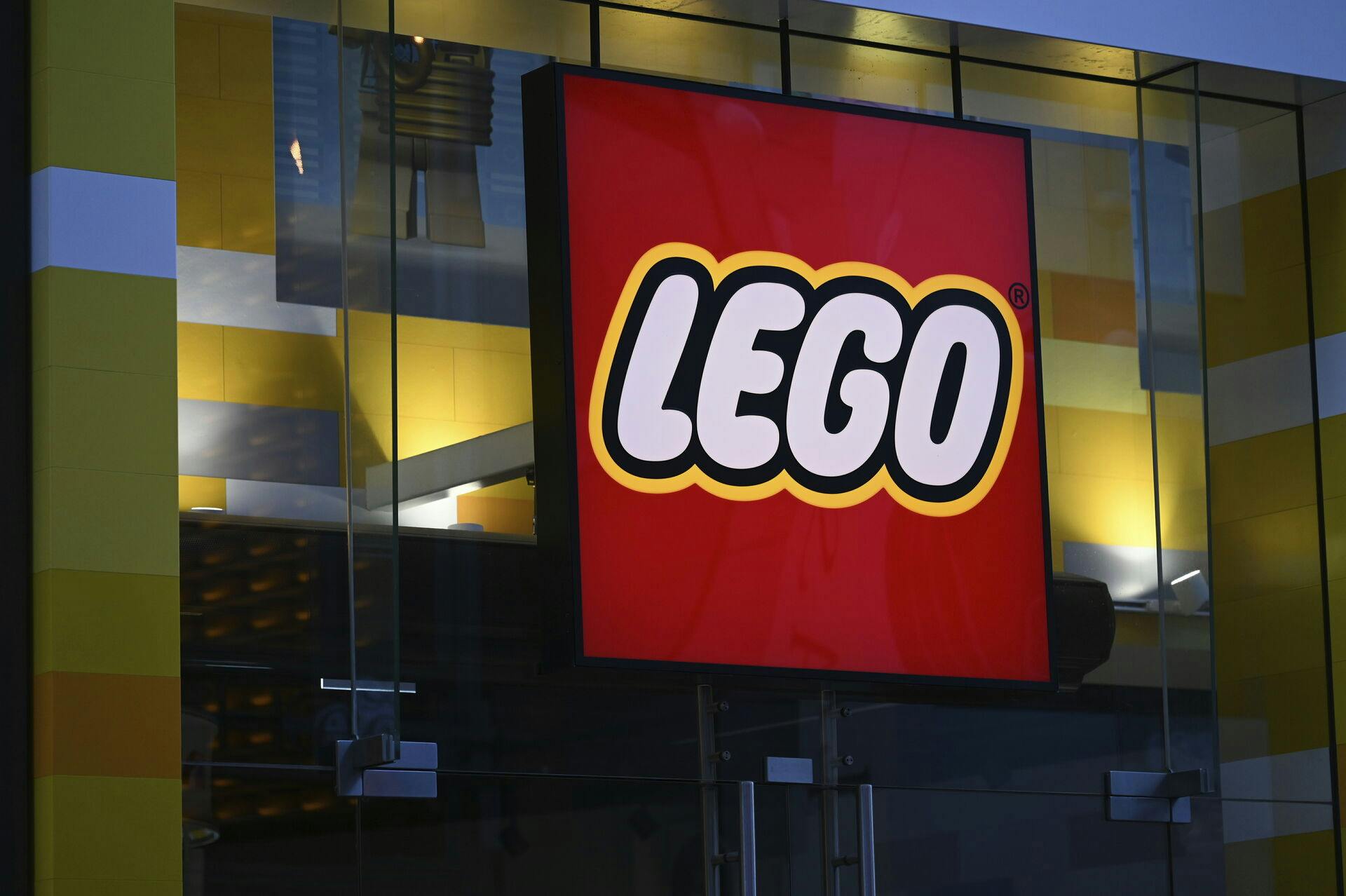 26 December 2023, North Rhine-Westphalia, Cologne: Logo, lettering of the toy manufacturer LEGO, known for its plastic building blocks, on a store. Photo by: Horst Galuschka/picture-alliance/dpa/AP Images