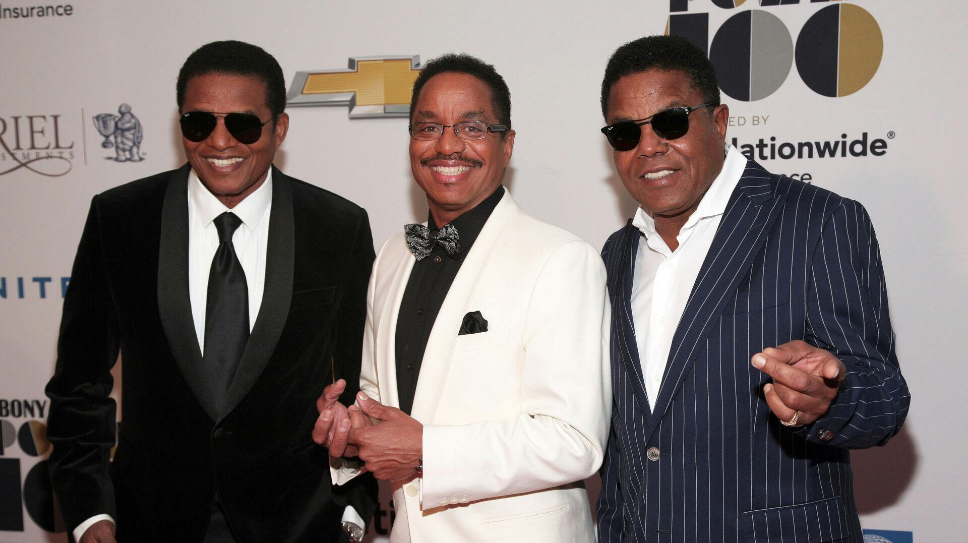 From left, musicians Jackie Jackson, Marlon Jackson and Tito Jackson attend the Ebony Power 100 Gala on Monday, Nov. 4, 2013 in New York. (Photo by Andy Kropa/Invision/AP)
