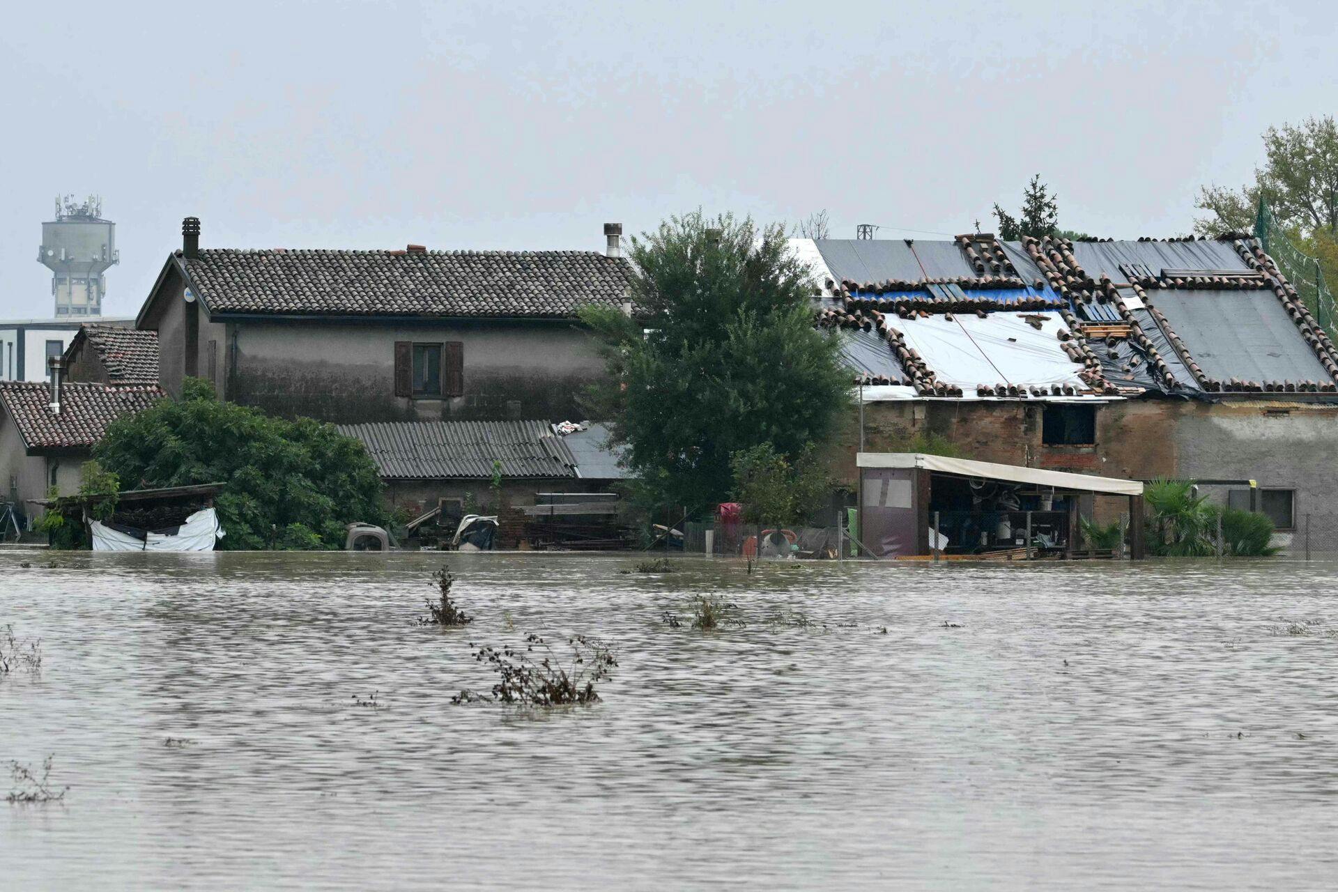 A picture shows floods in the town of Cotignola hits by the tail end of Storm Boris, on September 19, 2024. The strong winds and rains which have swept across central and eastern Europe, killing 24 people, pummeled the Emilia-Romagna and Marche regions, with over 1, 000 people evacuated from homes. (Photo by Andreas SOLARO / AFP)