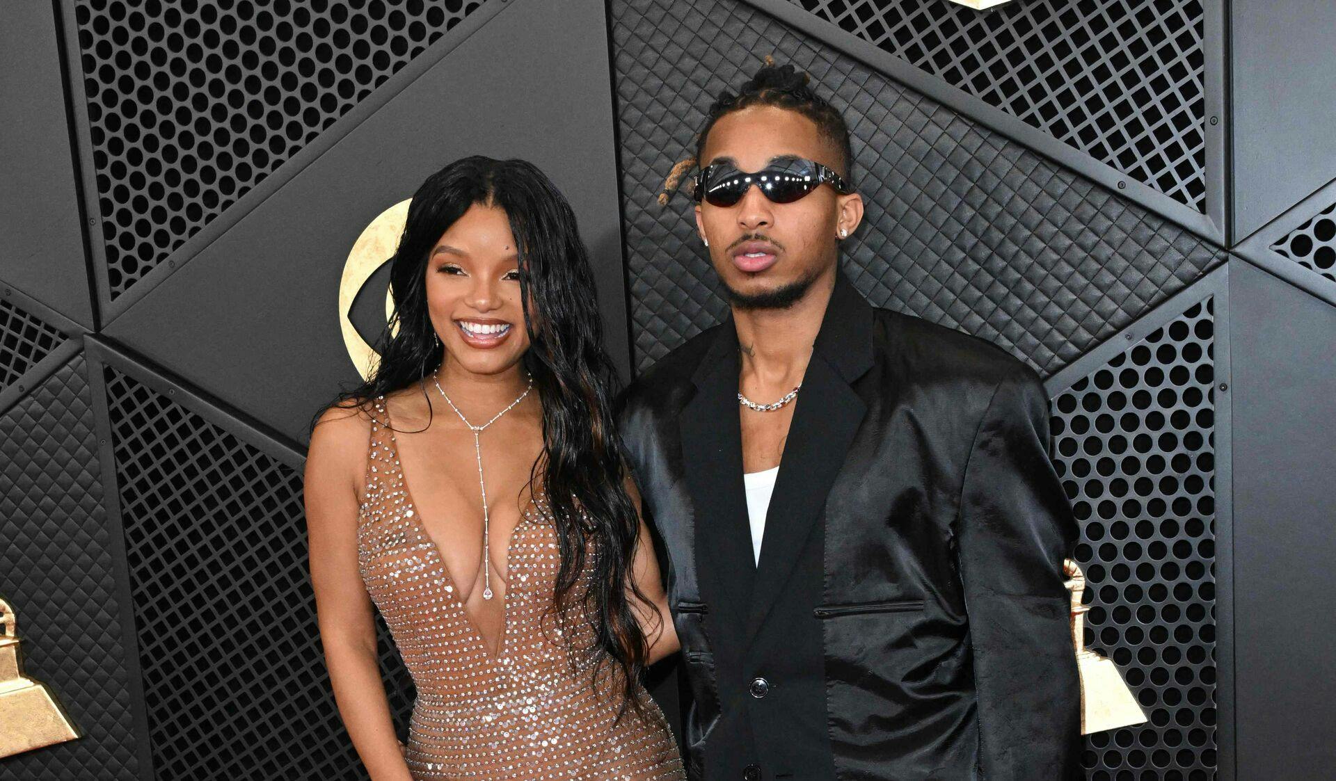 US singer Halle Bailey and and Darryl Dwayne "DDG" Grandberry Jr. arrive for the 66th Annual Grammy Awards at the Crypto.com Arena in Los Angeles on February 4, 2024. (Photo by Robyn BECK / AFP)