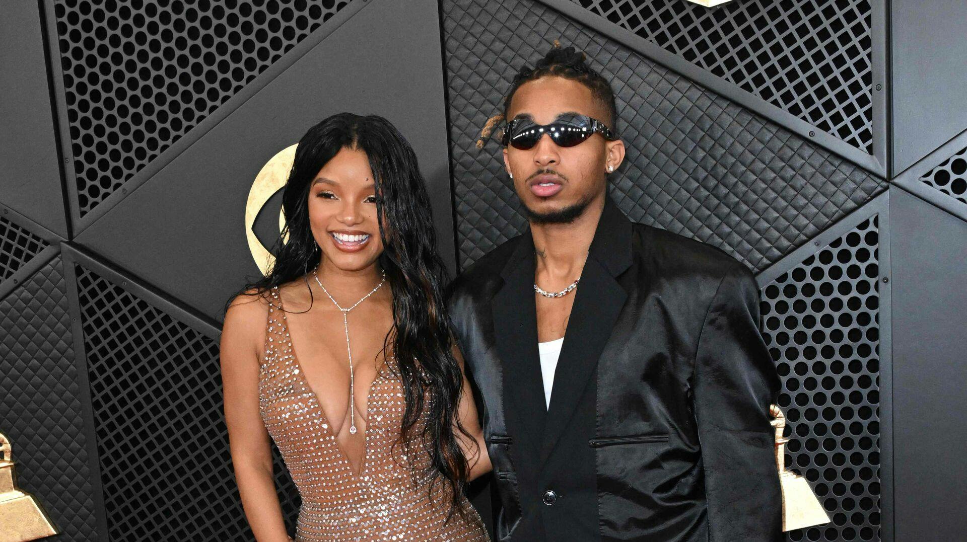 US singer Halle Bailey and and Darryl Dwayne "DDG" Grandberry Jr. arrive for the 66th Annual Grammy Awards at the Crypto.com Arena in Los Angeles on February 4, 2024. (Photo by Robyn BECK / AFP)