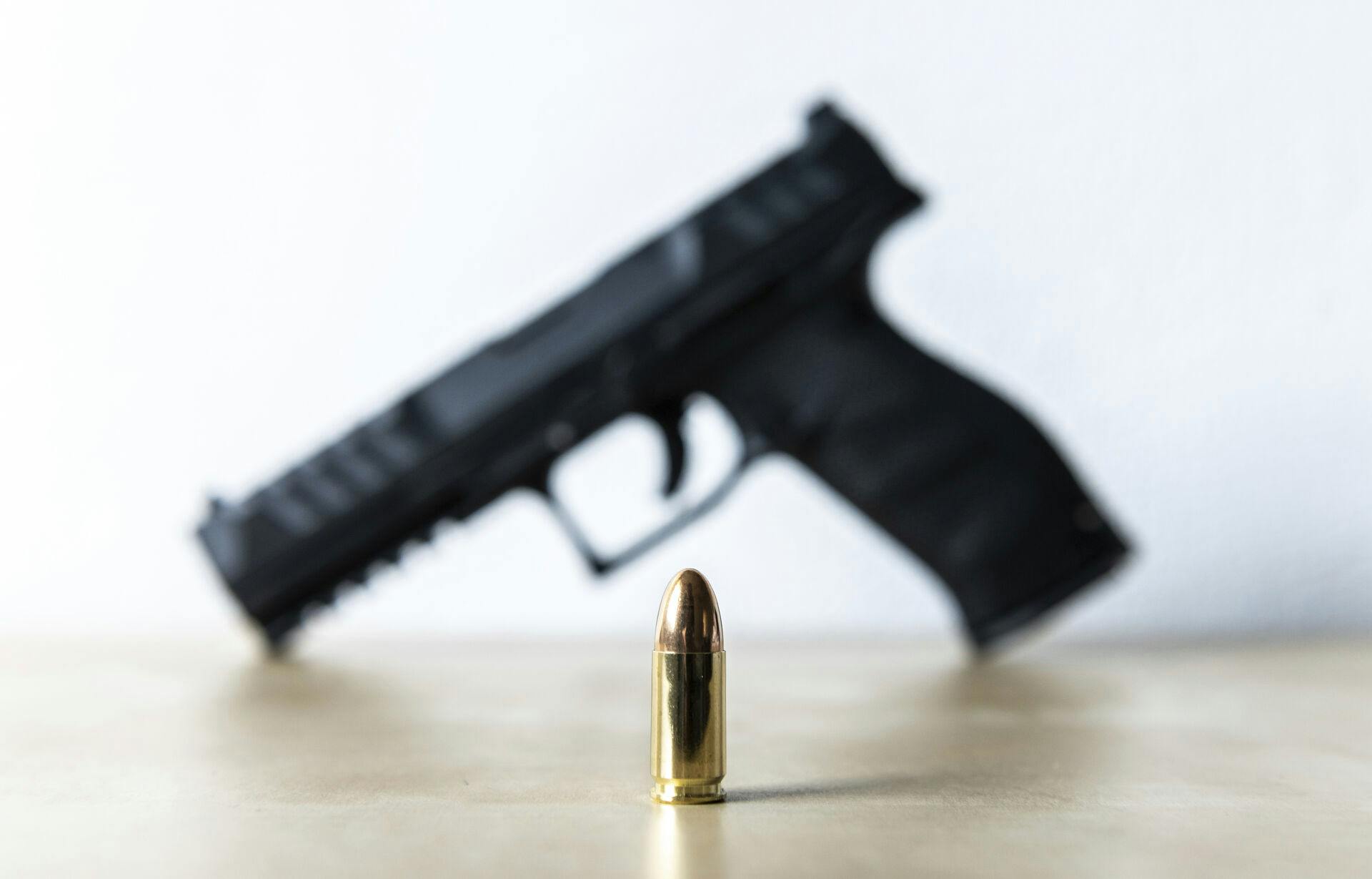 15 January 2022, Baden-Wuerttemberg, Rottweil: A 9mm cartridge stands on a table of a sport shooter. A Walther PDP Full Size 5" pistol can be seen in the background. Photo by: Silas Stein/picture-alliance/dpa/AP Images