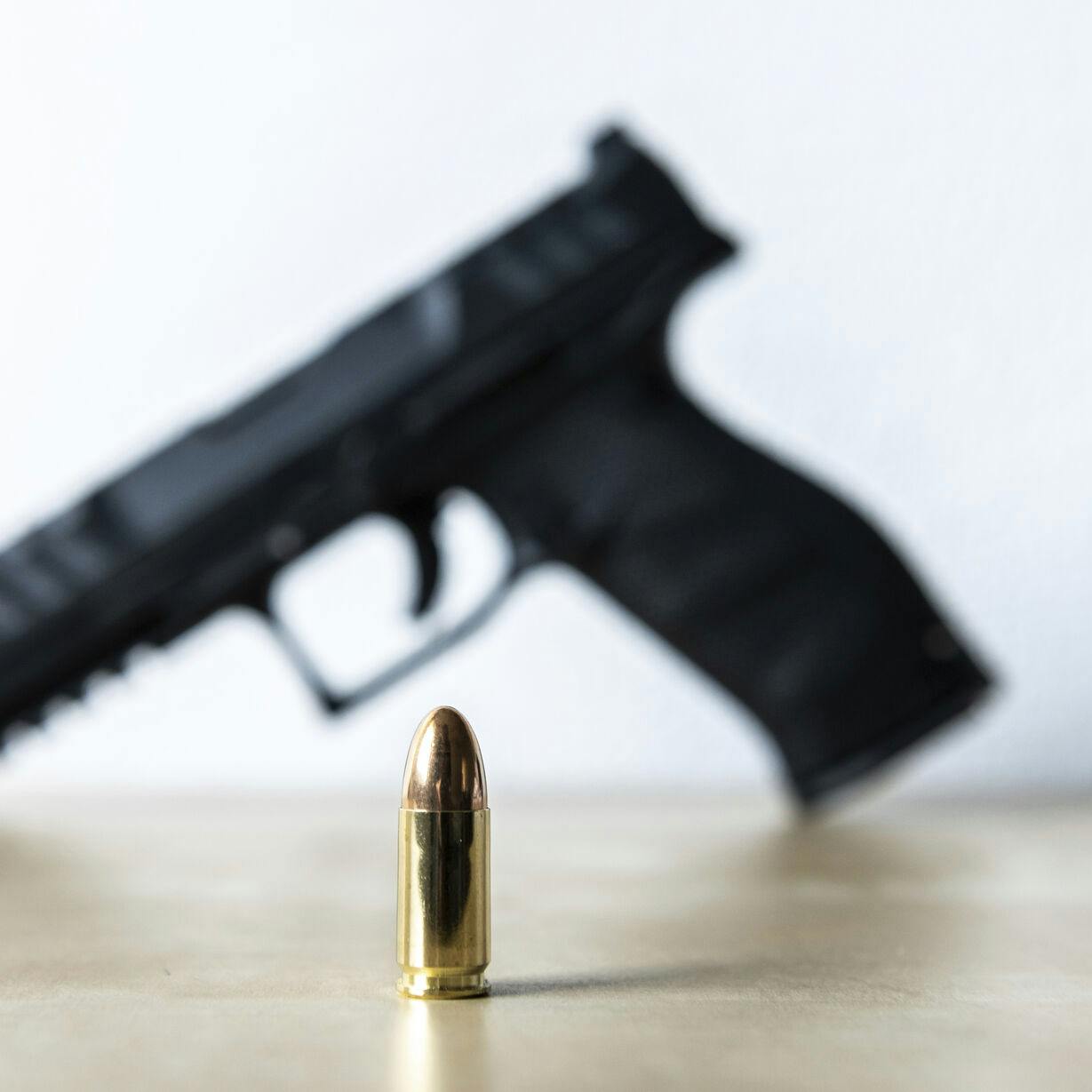 15 January 2022, Baden-Wuerttemberg, Rottweil: A 9mm cartridge stands on a table of a sport shooter. A Walther PDP Full Size 5" pistol can be seen in the background. Photo by: Silas Stein/picture-alliance/dpa/AP Images