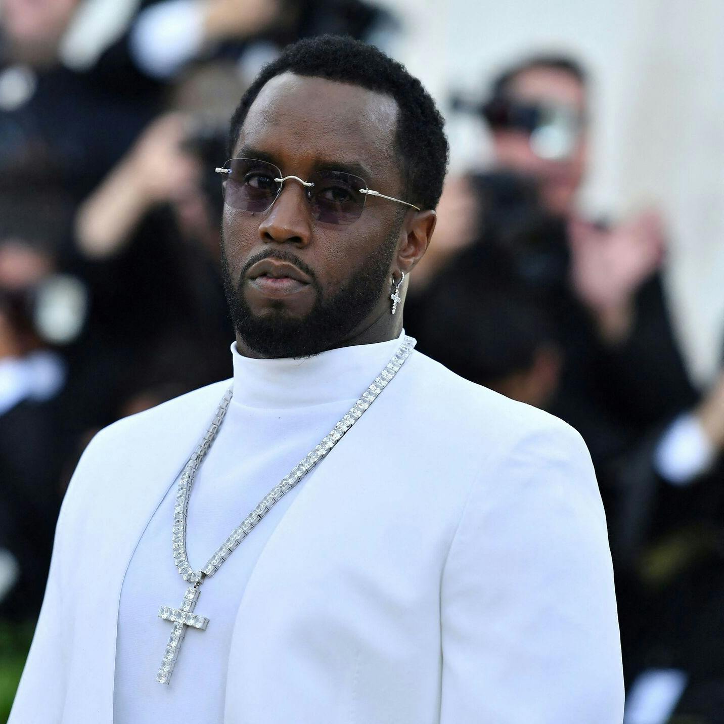 (FILES) Sean "Diddy" Combs arrives for the 2018 Met Gala on May 7, 2018, at the Metropolitan Museum of Art in New York. More than 100 alleged victims are to sue rapper Sean "Diddy" Combs and others for rape, sexual assault and sexual exploitation, a US lawyer announced on October 1, 2024. (Photo by Angela WEISS / AFP)