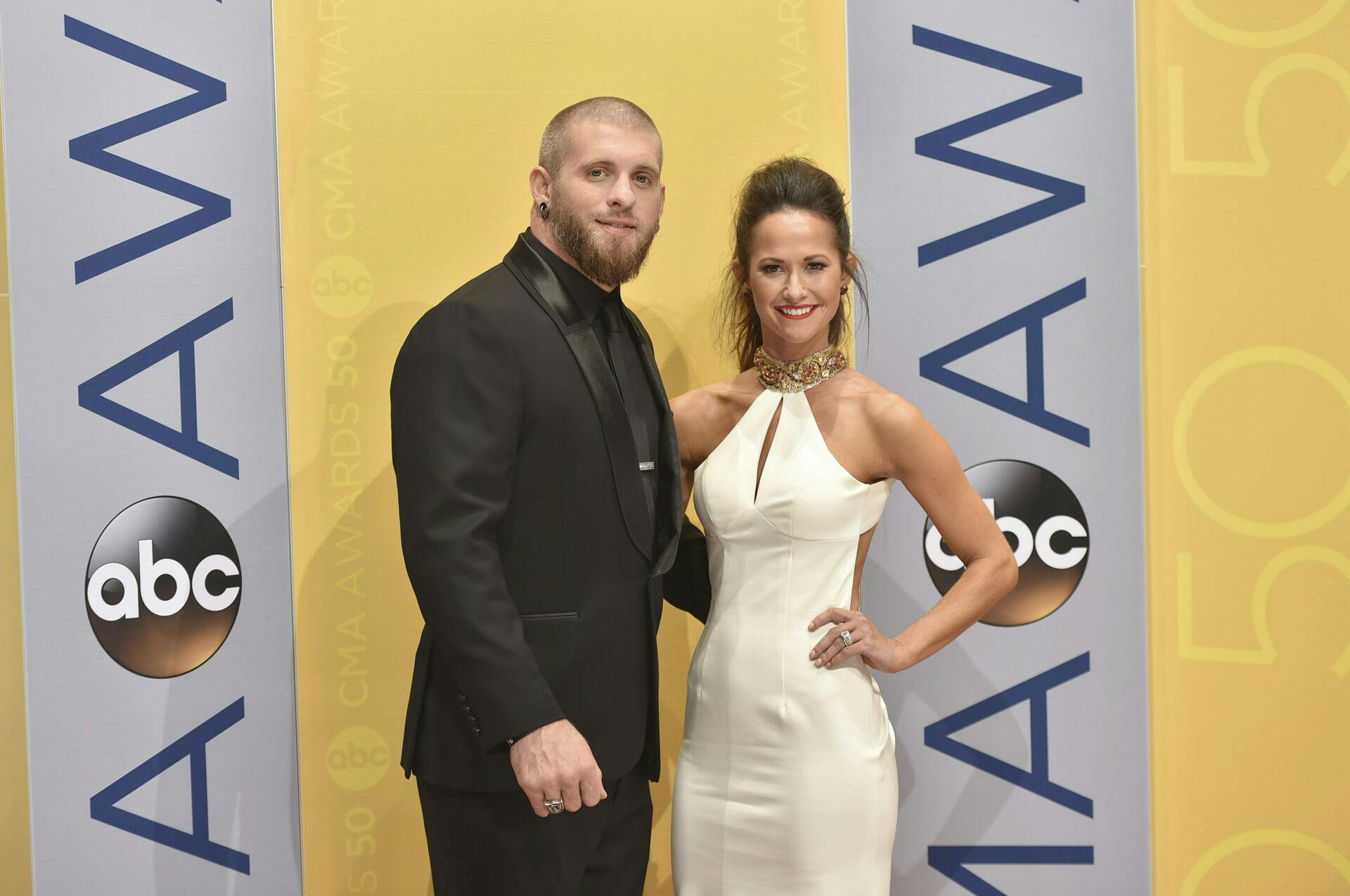 Brantley Gilbert, left, and Amber Cochran arrive at the 50th annual CMA Awards at the Bridgestone Arena on Wednesday, Nov. 2, 2016, in Nashville, Tenn. (Photo by Evan Agostini/Invision/AP)