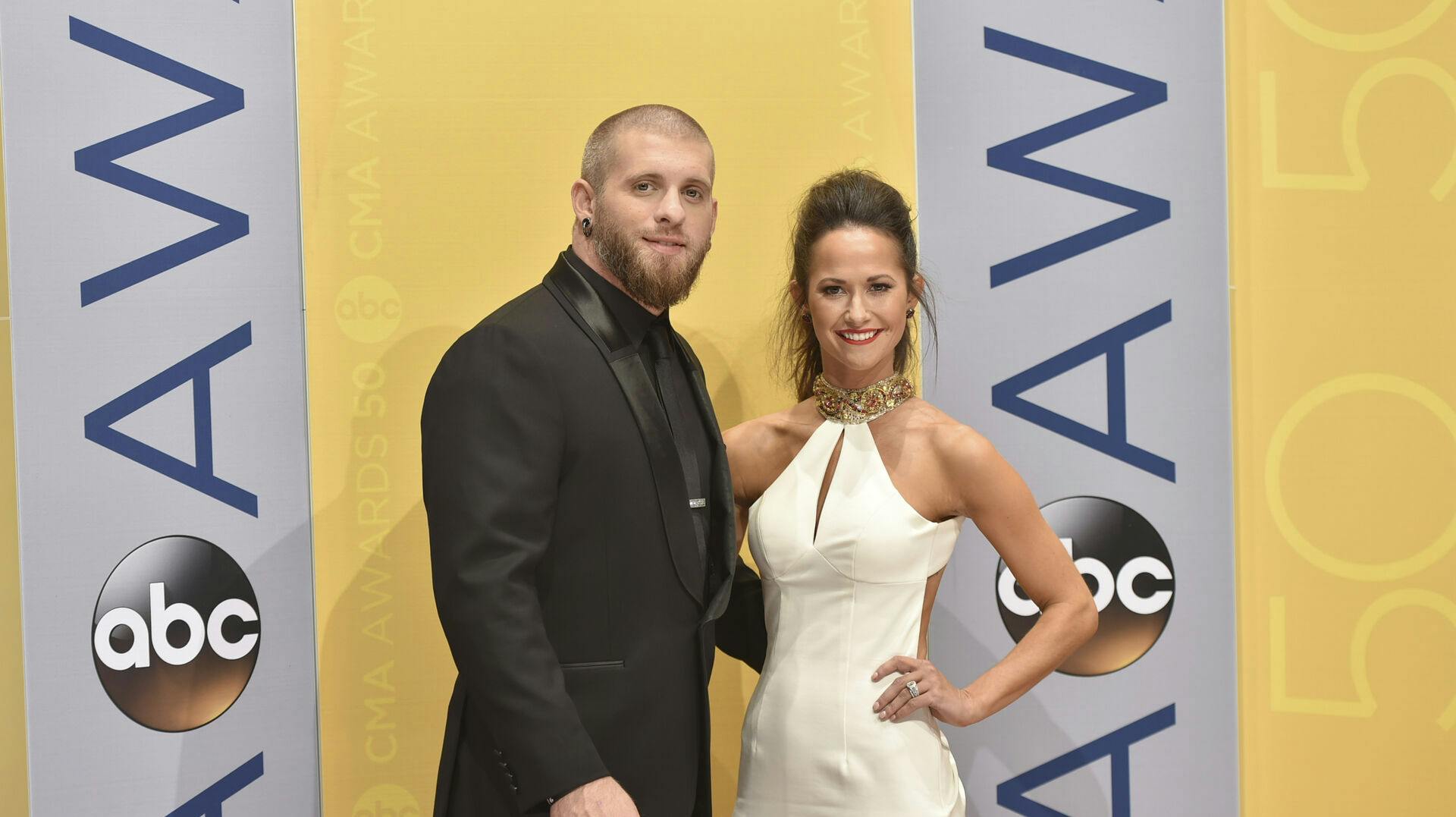 Brantley Gilbert, left, and Amber Cochran arrive at the 50th annual CMA Awards at the Bridgestone Arena on Wednesday, Nov. 2, 2016, in Nashville, Tenn. (Photo by Evan Agostini/Invision/AP)