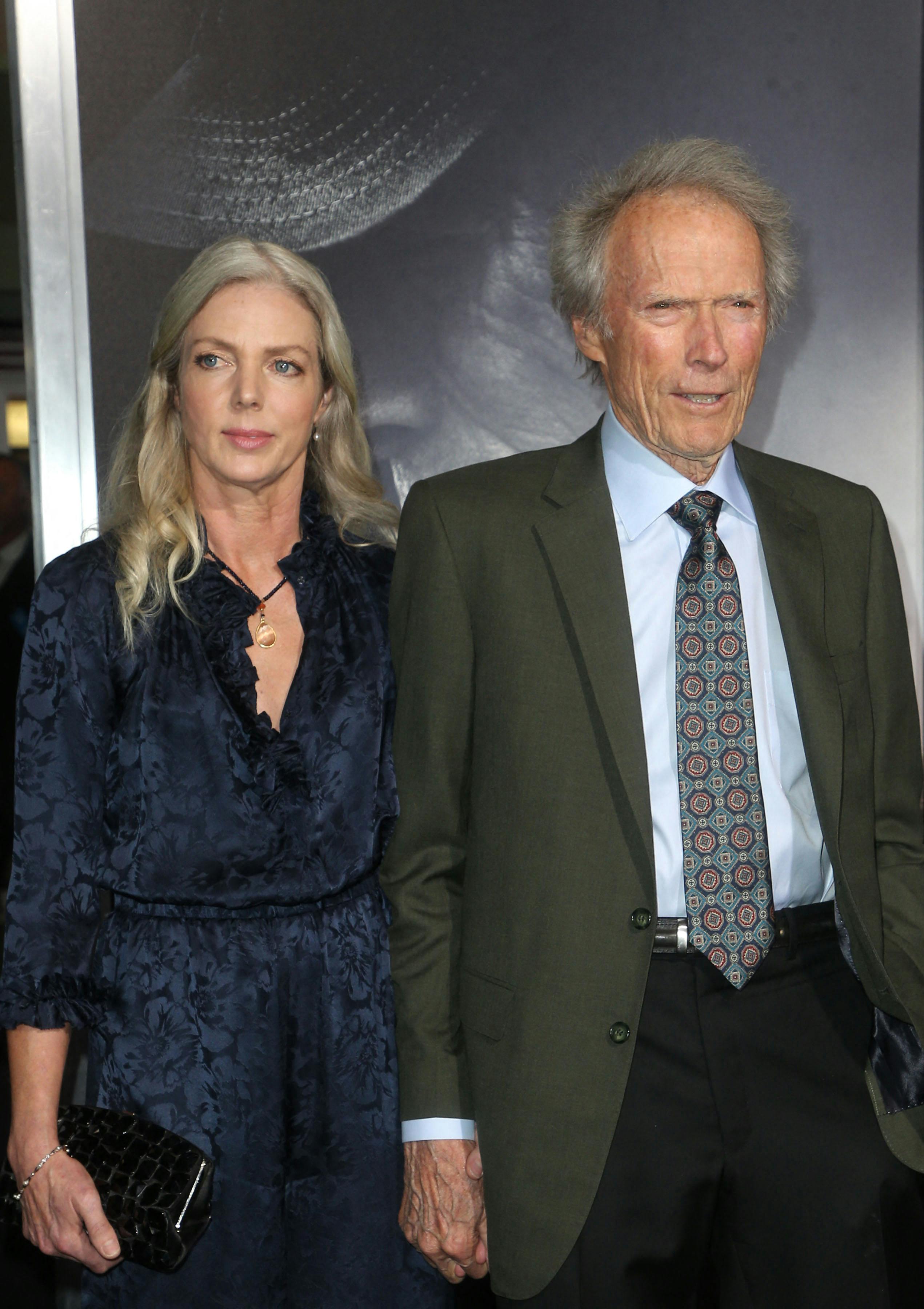 WESTWOOD, CA - DECEMBER 10: Christina Sandera, Clint Eastwood, at the world premiere of The Mule at the Regency Village Theatre in Westwood, California on December 10, 2018. CAP/MPIFS ©MPIFS/Capital Pictures. 10 Dec 2018 Pictured: Christina Sandera, Clint Eastwood. Photo credit: MPIFS/Capital Pictures / MEGA TheMegaAgency.com +1 888 505 6342 (Mega Agency TagID: MEGA1171101_002.jpg) [Photo via Mega Agency]