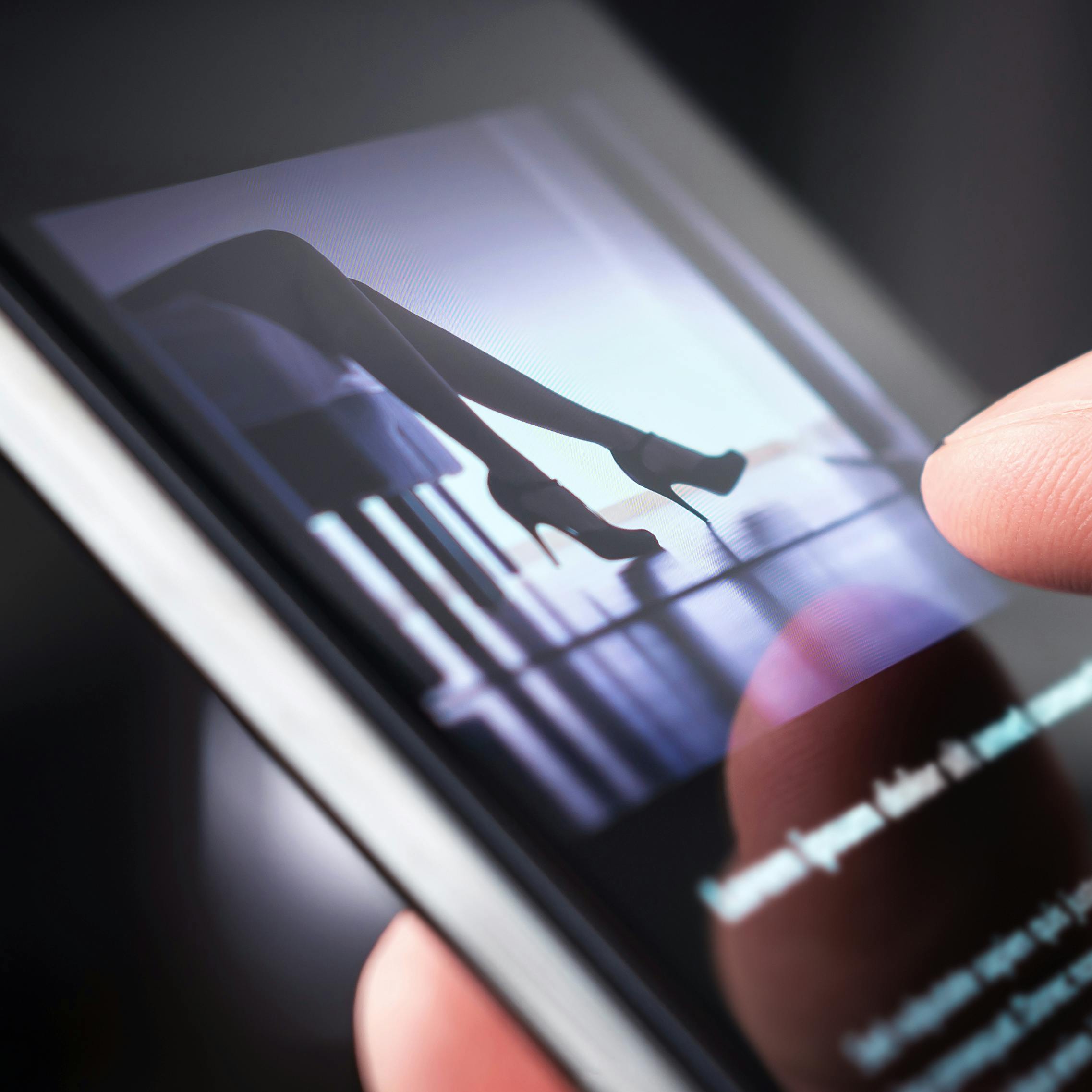 Man watching erotic video or looking at sexy photo with phone. Sex shop or online porn website. Person reading news article about sexual topic. Escort business, strip show or adult content on internet
