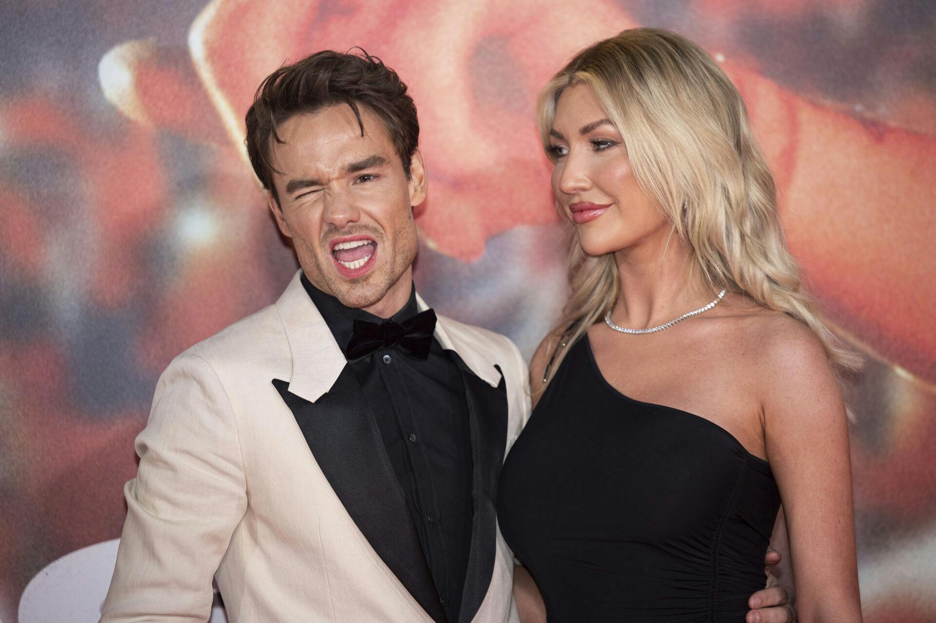 Liam Payne, left, and Kate Cassidy pose for photographers upon arrival at the premiere of the film 'All of Those Voices' in London Thursday, March 16, 2023. (Photo by Vianney Le Caer/Invision/AP)