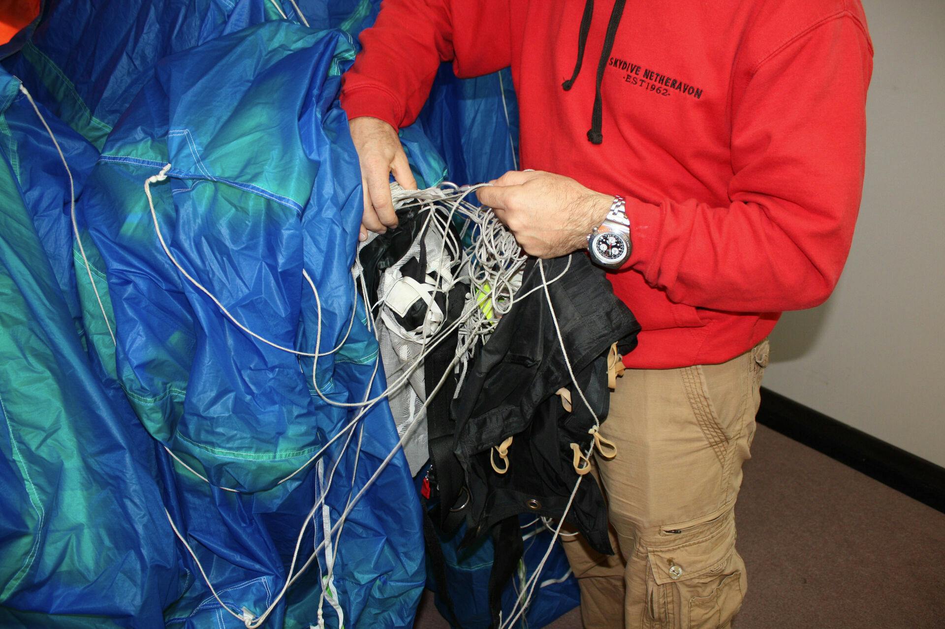 The tampered parachute worn by Victoria Cilliers, seen here after being shown to the jury at Winchester Crown Court