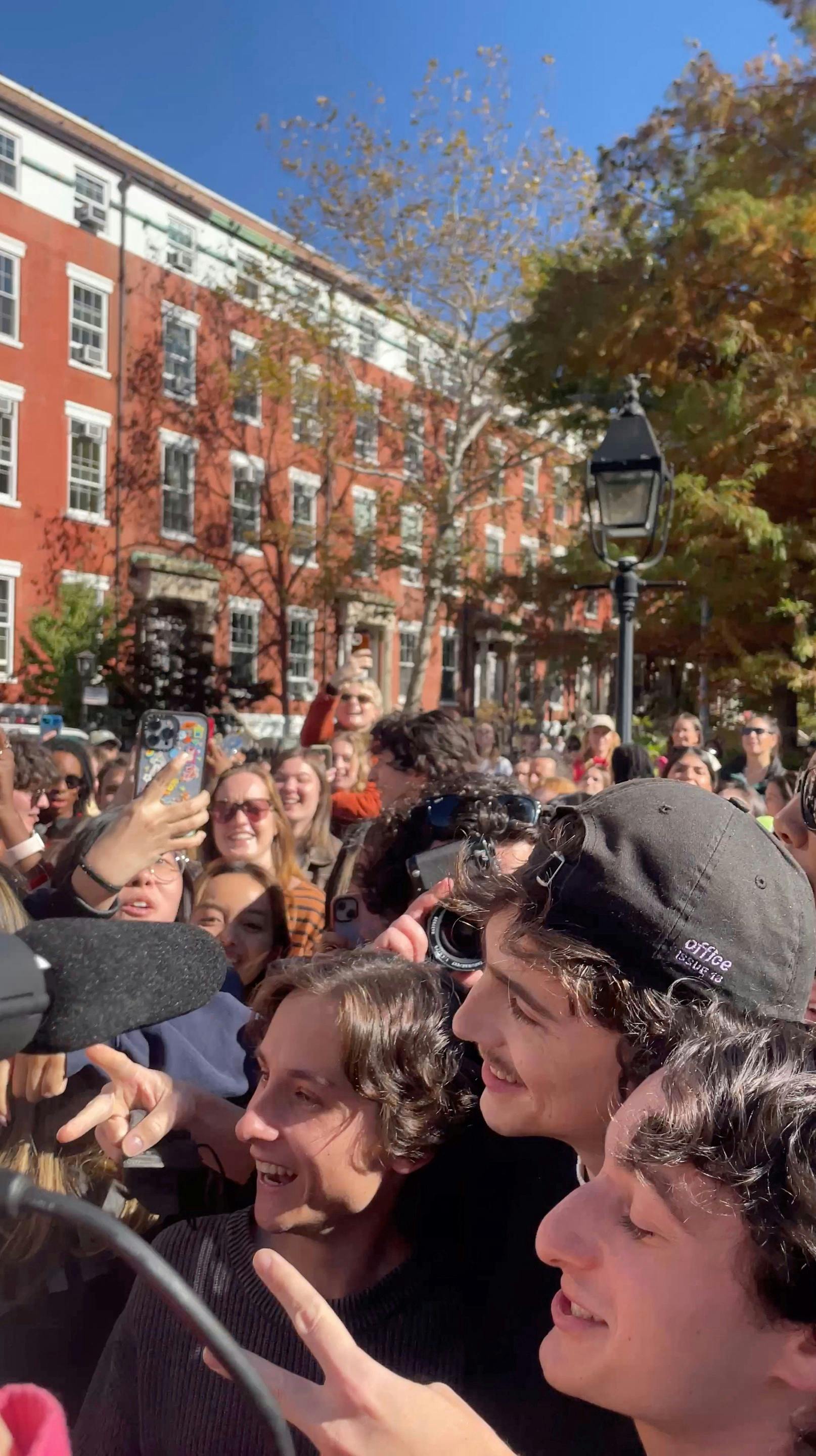 Actor Timothee Chalamet (in black hat) poses with contestants in a lookalike contest after surprising fans by turning up at the event in New York, U.S., October 27, 2024 in this still image obtained from social media video. @ITWEETABTTV VIA X/via REUTERS THIS IMAGE HAS BEEN SUPPLIED BY A THIRD PARTY. MANDATORY CREDIT.NO RESALES.NO ARCHIVES.