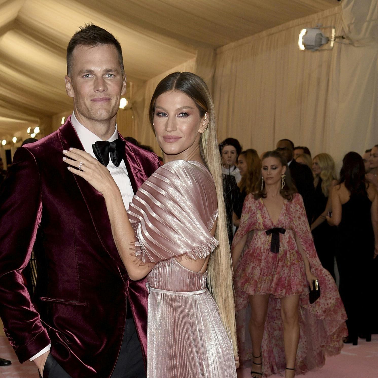 FILE - Tom Brady, left, and Gisele Bundchen attend The Metropolitan Museum of Art's Costume Institute benefit gala on May 6, 2019, in New York. The couple announced Friday they have finalized their divorce, ending their 13-year marriage. (Photo by Evan Agostini/Invision/AP, File)