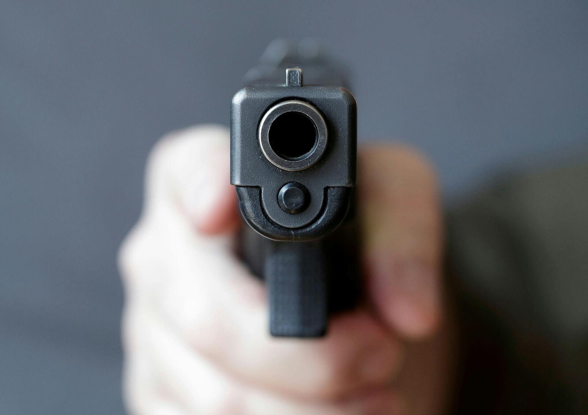 A gun owner displays a Glock 20, 10 mm Auto pistol in Vienna, Austria, March 22, 2018. REUTERS/Heinz-Peter Bader