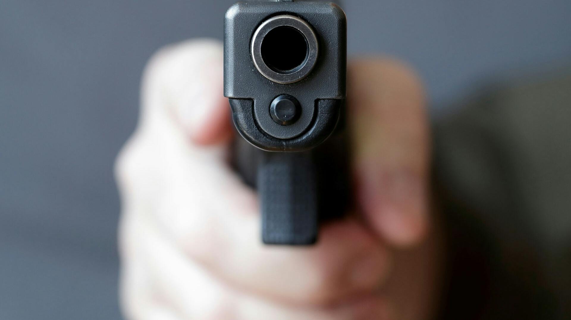 A gun owner displays a Glock 20, 10 mm Auto pistol in Vienna, Austria, March 22, 2018. REUTERS/Heinz-Peter Bader