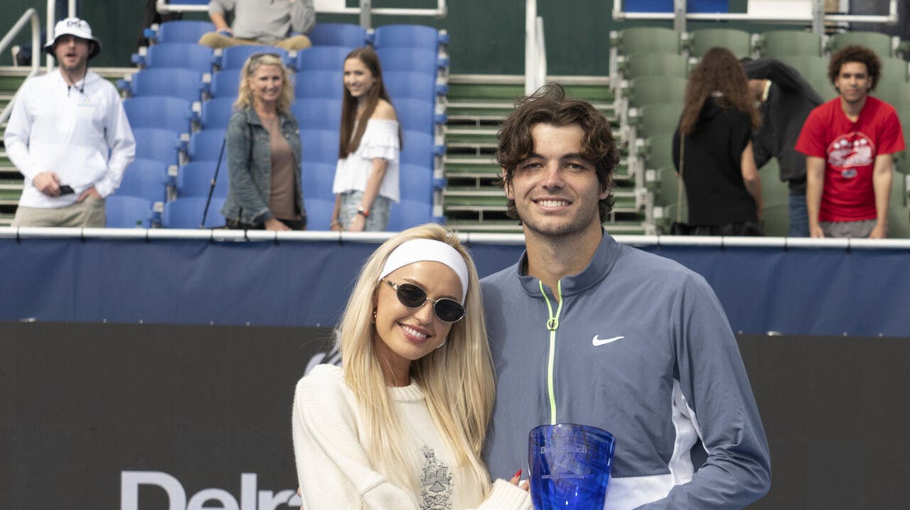 DELRAY BEACH, FL - FEBRUARY 19: Morgan Riddle poses with Taylor Fritz (USA) after he wins the 2024 Delray Beach Open on February 19, 2024, at the Delray Beach Tennis Center in Delray Beach, Florida. Credit: Andrew Patron/MediaPunch /IPX