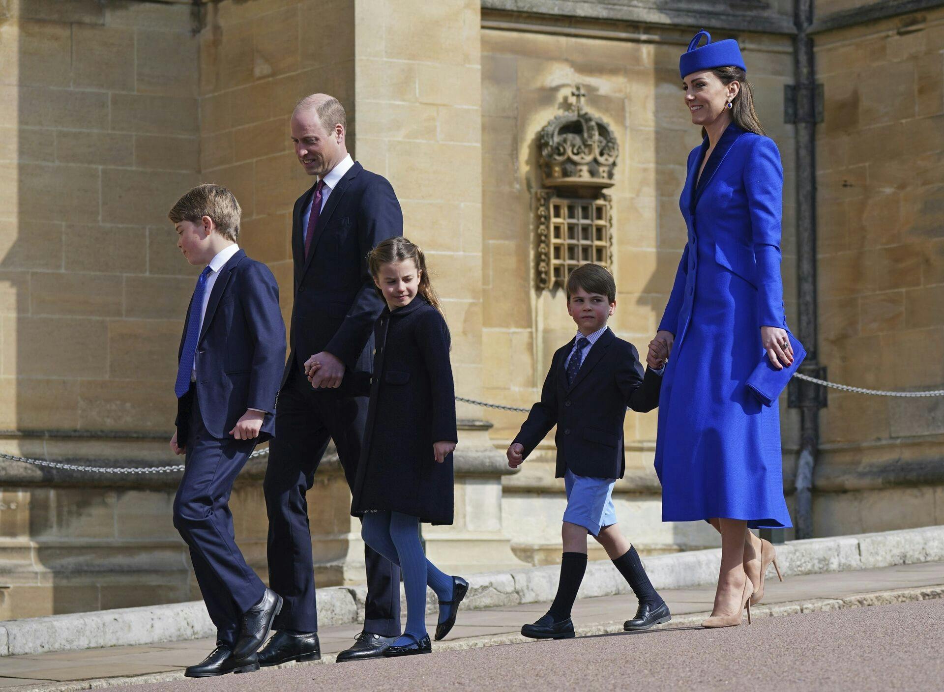 Britain's Prince William and Kate, Princess of Wales with their children Prince George, left, Princess Charlotte and Prince Louis attend the Easter Mattins Service at St George's Chapel at Windsor Castle in Windsor, England, Sunday April 9, 2023. (Yui Mok/Pool via AP)