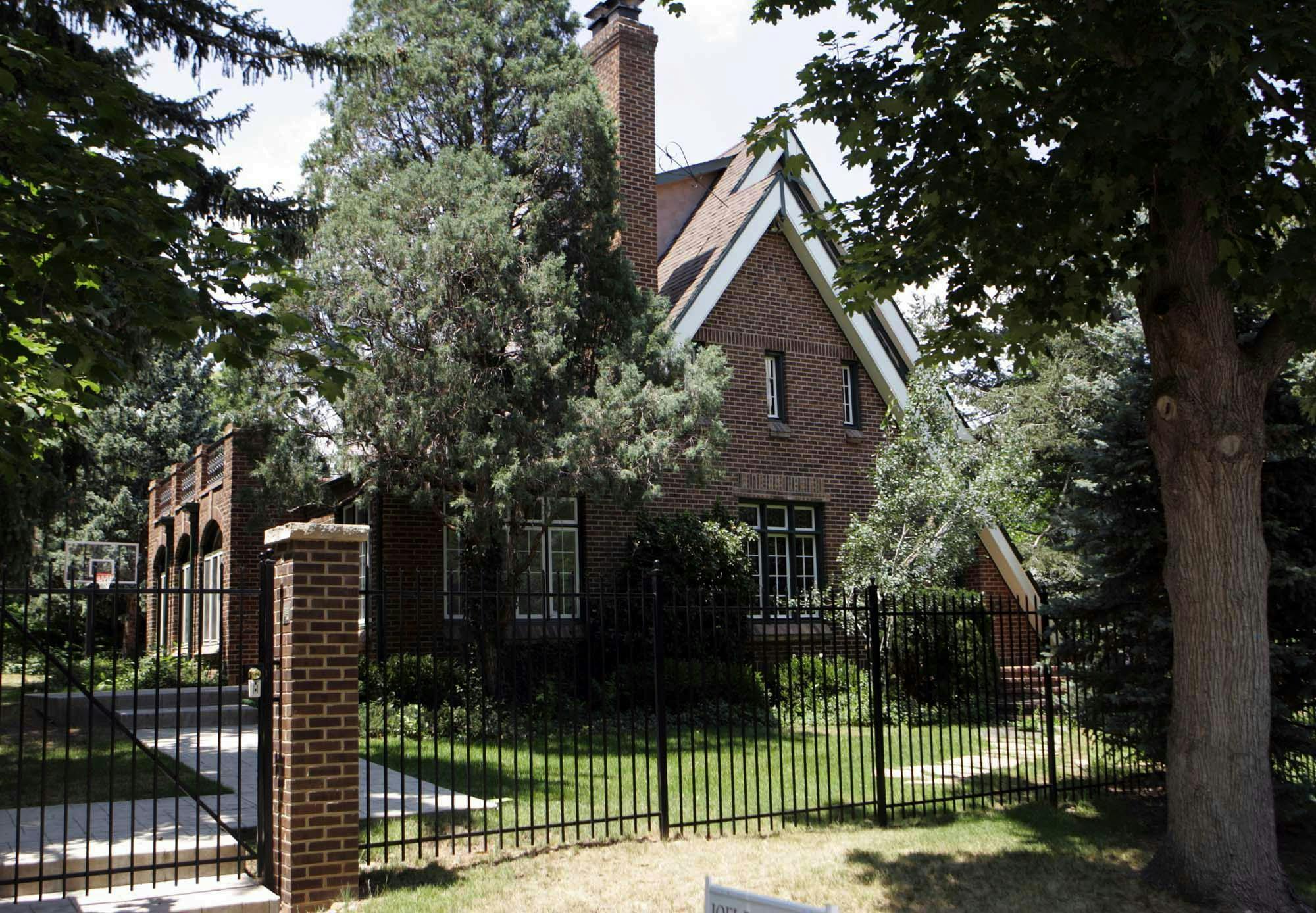 The home made infamous by the 1996 murder of six-year-old JonBenet, is seen Saturday, June 24, 2006, in Boulder, Colo., Patsy Ramsey, who was thrust into the national spotlight by the unsolved slaying of her daughter, died Saturday, June 24, 2006, following a long battle with ovarian cancer, her lawyer said. She was 49. (AP Photo/Jack Dempsey)