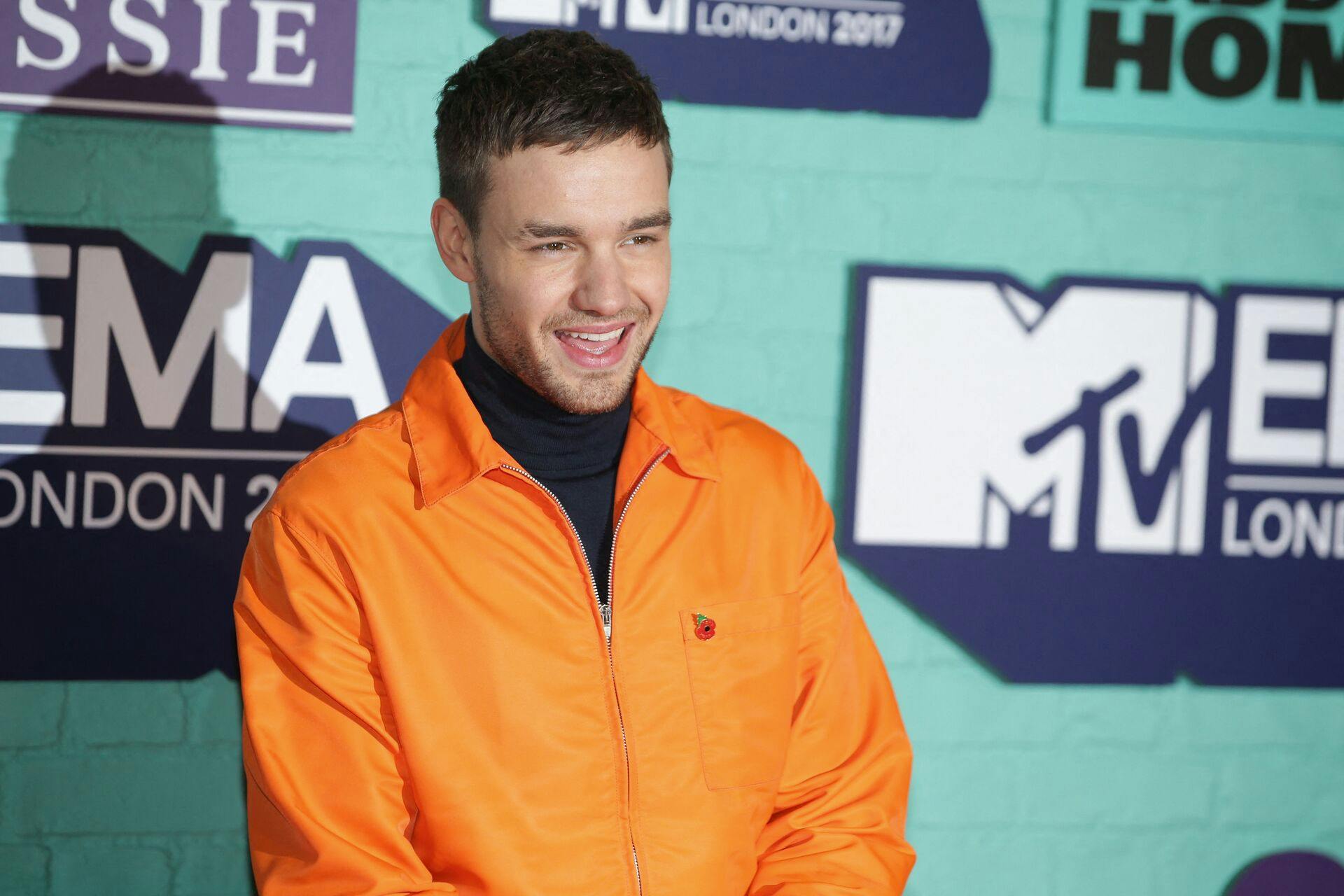 (FILES) British singer-songwriter Liam Payne poses on the red carpet arriving to attend the 2017 MTV Europe Music Awards (EMA) at Wembley Arena in London on November 12, 2017. Liam Payne, who died aged 31 after plunging from a hotel balcony in Buenos Aires, on October 16, 2024 spent more than half his life in the public eye as a member of one of the world's most successful boy bands. (Photo by Daniel LEAL / AFP)