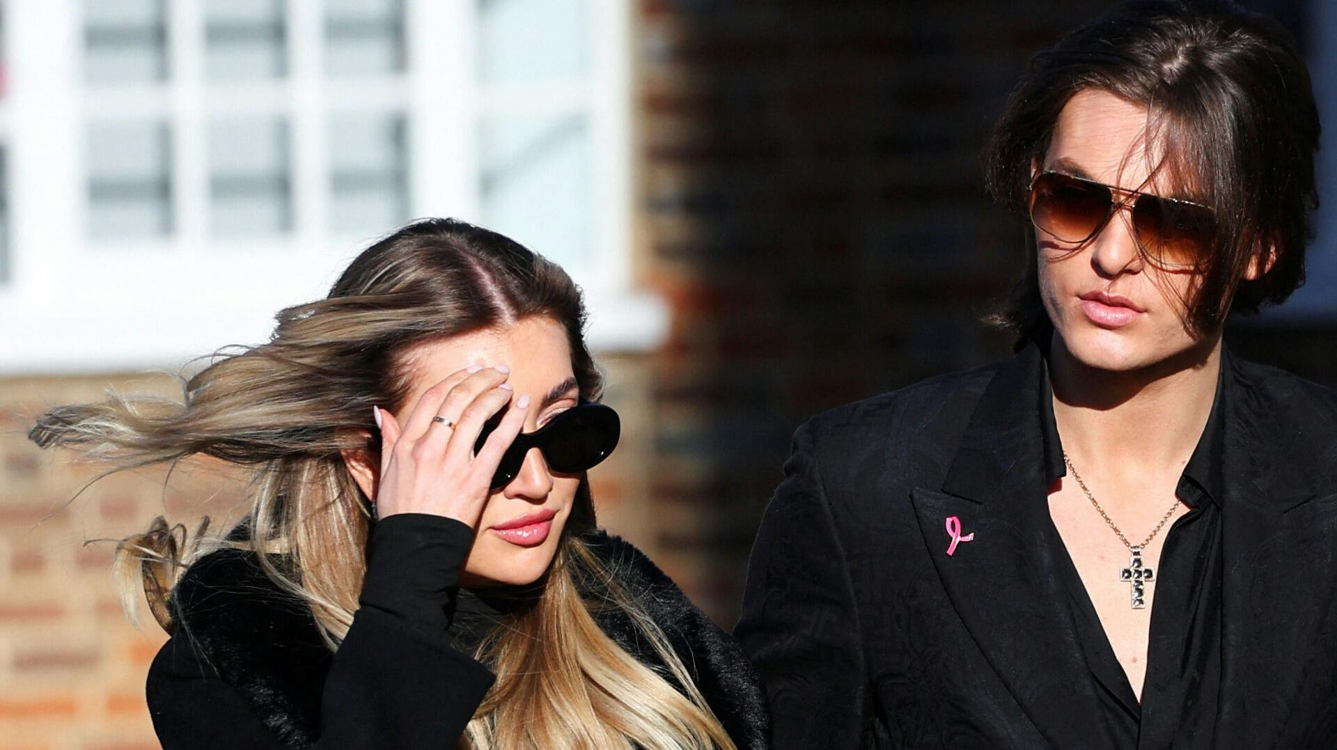 Actor and model Damian Hurley arrives with Kate Cassidy to attend the funeral of former One Direction singer Liam Payne at St. Mary's Church in Amersham, near London, Britain, November 20, 2024. REUTERS/Toby Melville