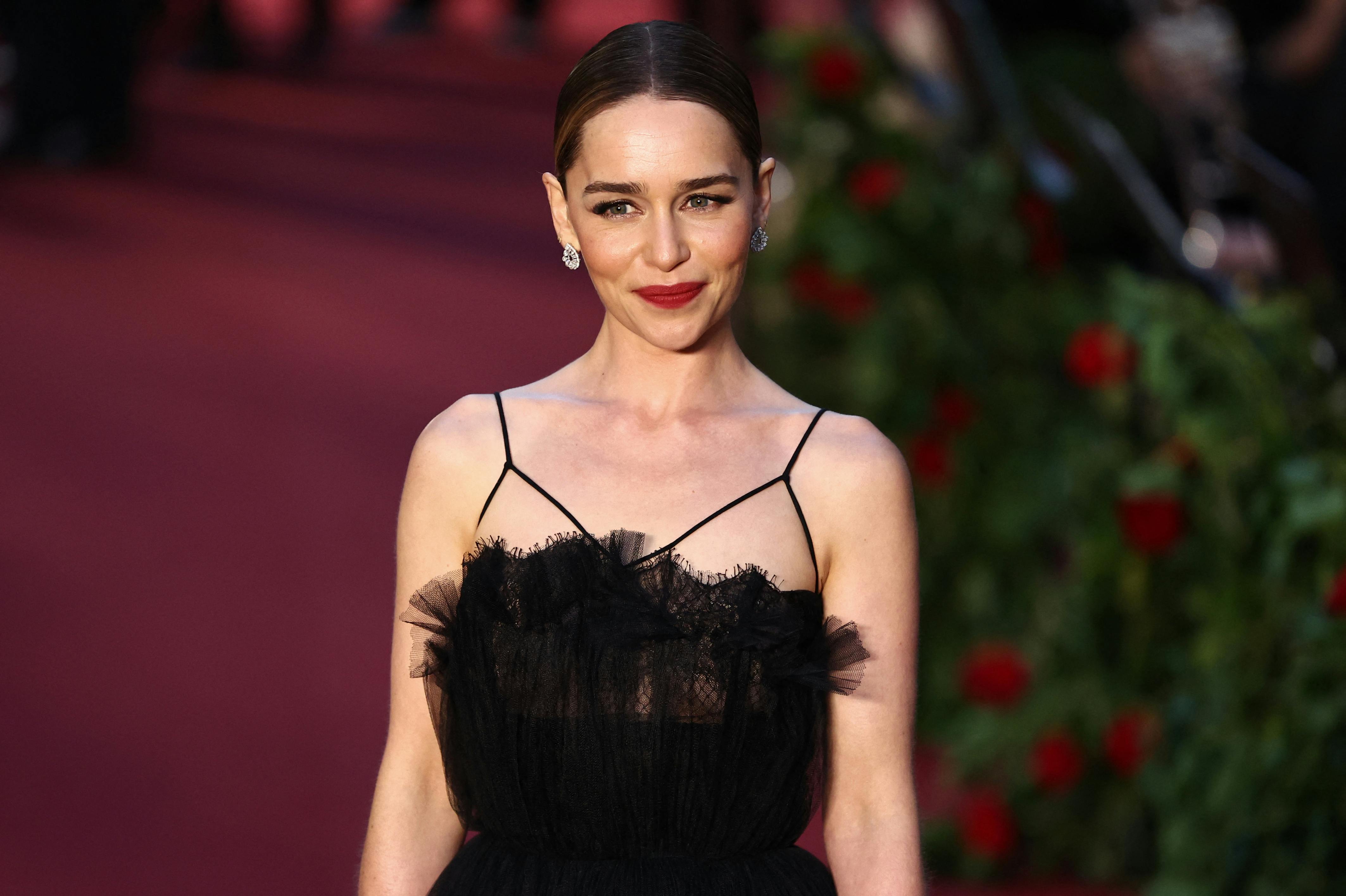 British actress Emilia Clarke poses upon arrival to attend the "Vogue World: London" event at the Theatre Royal Drury Lane in central London on the eve of London Fashion Week on September 14, 2023. HENRY NICHOLLS / AFP