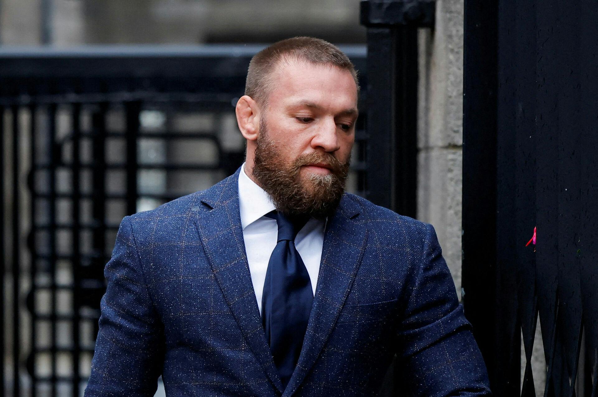 FILE PHOTO: Irish mixed martial arts fighter Conor McGregor arrives at court, on the day he attends a civil trial on allegations of sexual assault, in Dublin, Ireland November 19, 2024. REUTERS/Clodagh Kilcoyne/File Photo