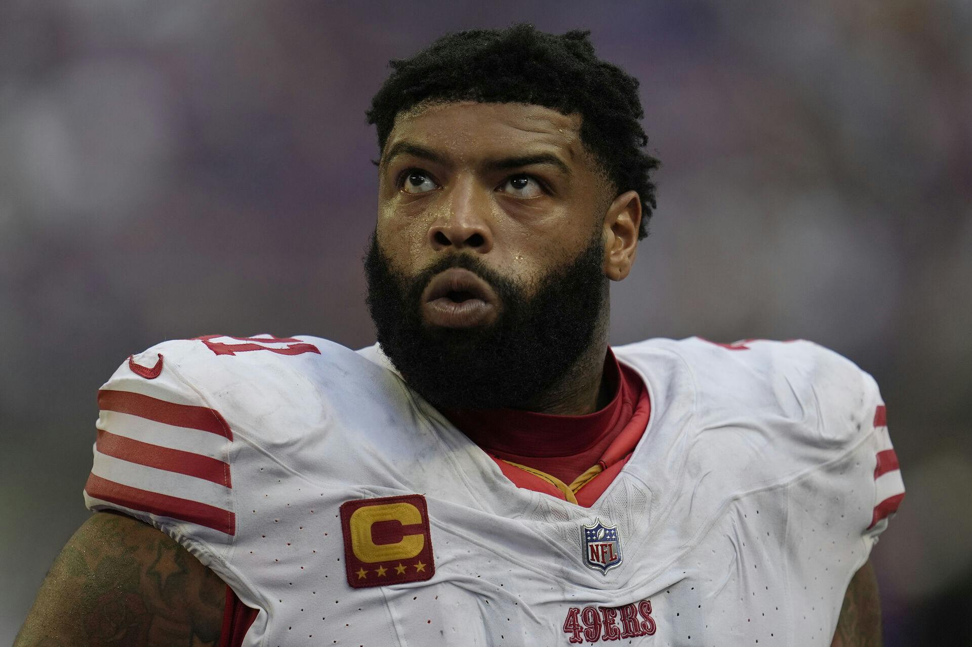 San Francisco 49ers offensive tackle Trent Williams (71) walks off the field after the 23-17 loss to the Minnesota Vikings of an NFL football game Sunday, Sept. 15, 2024, in Minneapolis. (AP Photo/Abbie Parr)