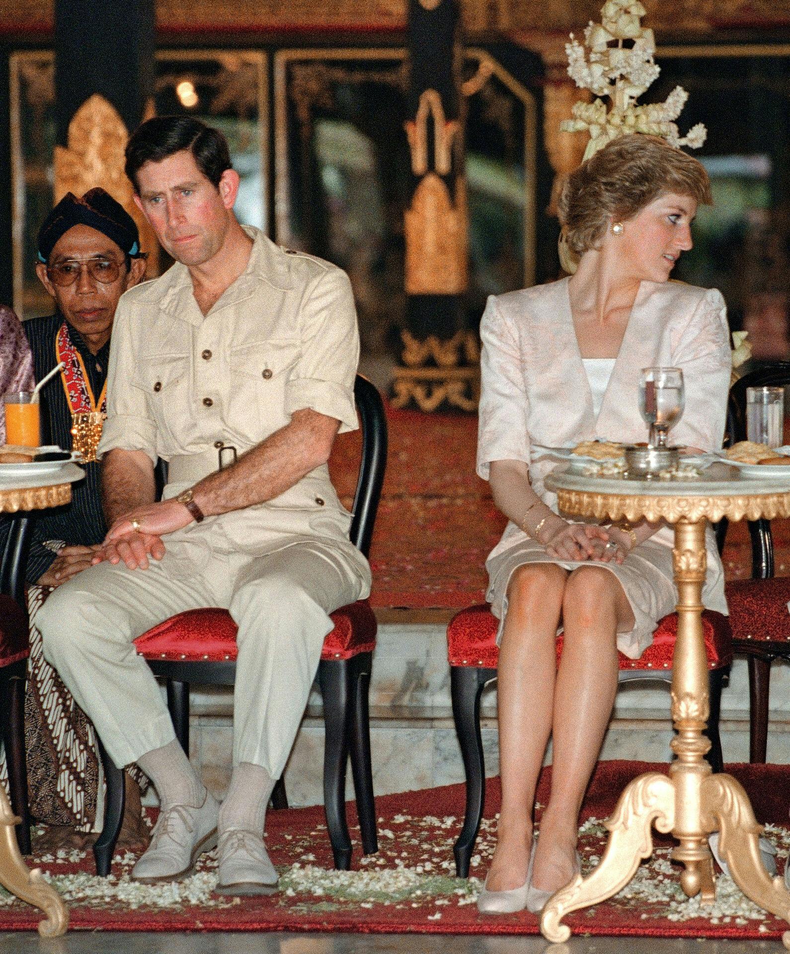 Prince and Princess of Wales watch 05 November 1989 Indonesian tribal dancers in Yogyakarta, Indoniesia. The Princess Diana announced 28 February that she has agreed to divorce Prince Charles and end their 14 year marriage. The couple have been separated for over three years. AFP PHOTO Kazuhiro NOGI