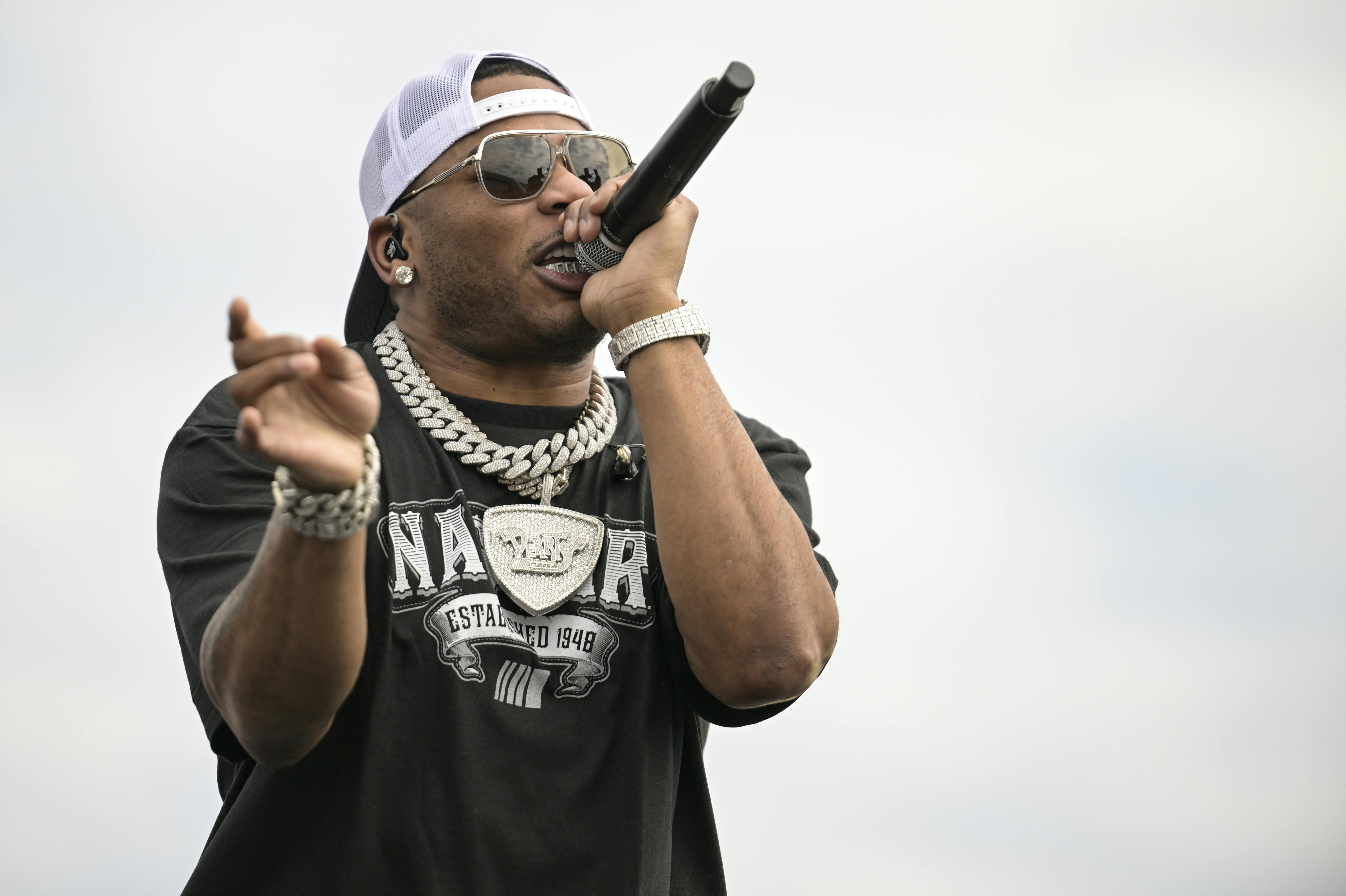 Rapper Nelly performs prior to a NASCAR Cup Series auto race at Charlotte Motor Speedway, Sunday, Oct. 9, 2022, in Concord, N.C. (AP Photo/Matt Kelley)