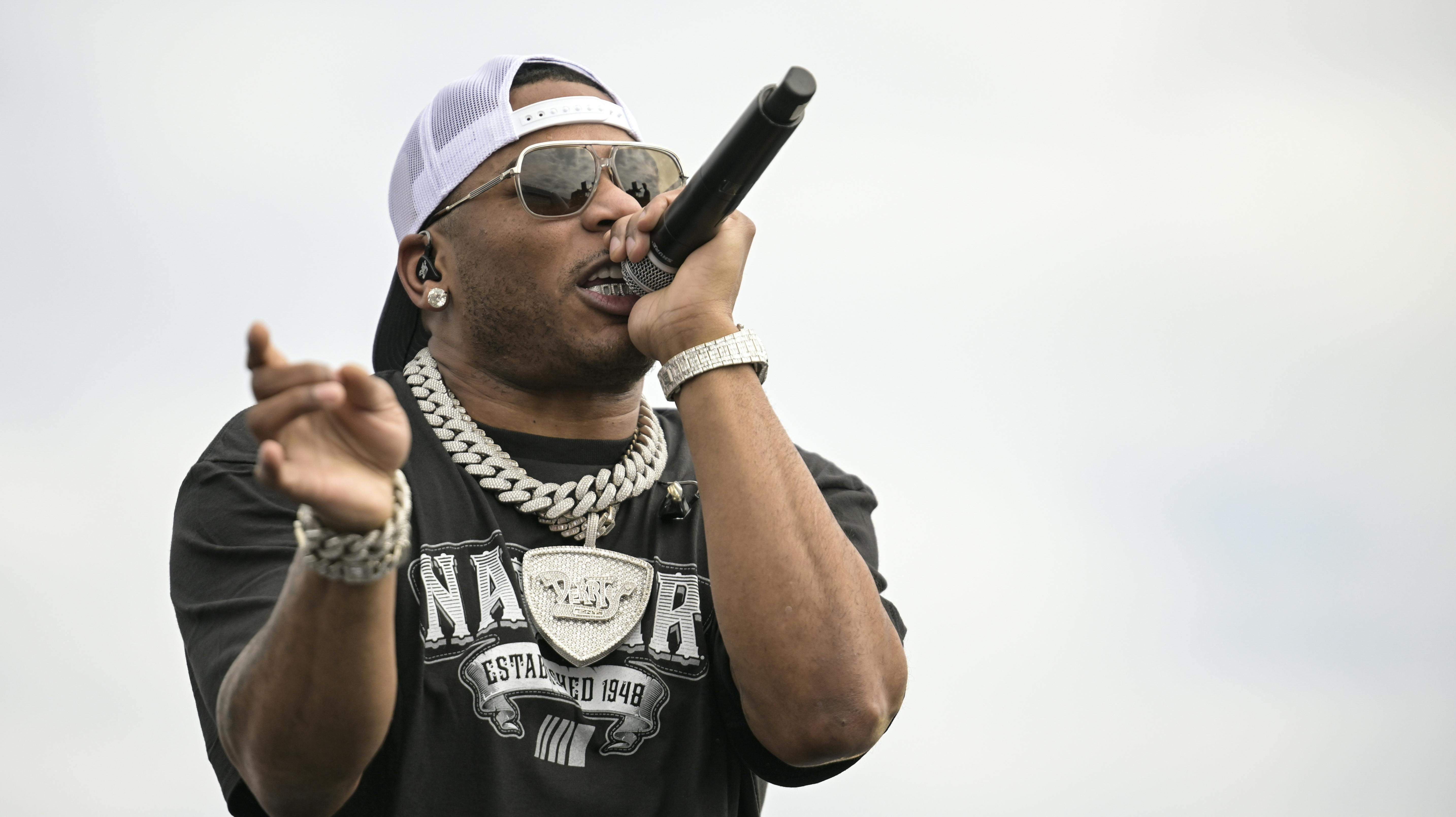 Rapper Nelly performs prior to a NASCAR Cup Series auto race at Charlotte Motor Speedway, Sunday, Oct. 9, 2022, in Concord, N.C. (AP Photo/Matt Kelley)