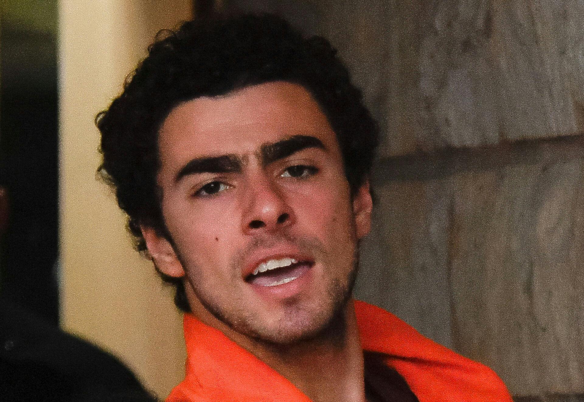 Luigi Mangione, 26, a suspect in the New York City killing of UnitedHealth executive Brian Thompson, arrives for an extradition hearing at Blair County Court House in Hollidaysburg, Pennsylvania, U.S. December 10, 2024. REUTERS/Matthew Hatcher