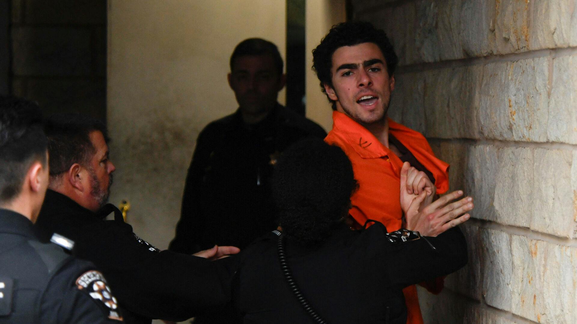 Luigi Mangione, 26, a suspect in the New York City killing of UnitedHealth executive Brian Thompson, arrives for an extradition hearing at Blair County Court House in Hollidaysburg, Pennsylvania, U.S. December 10, 2024. REUTERS/Matthew Hatcher