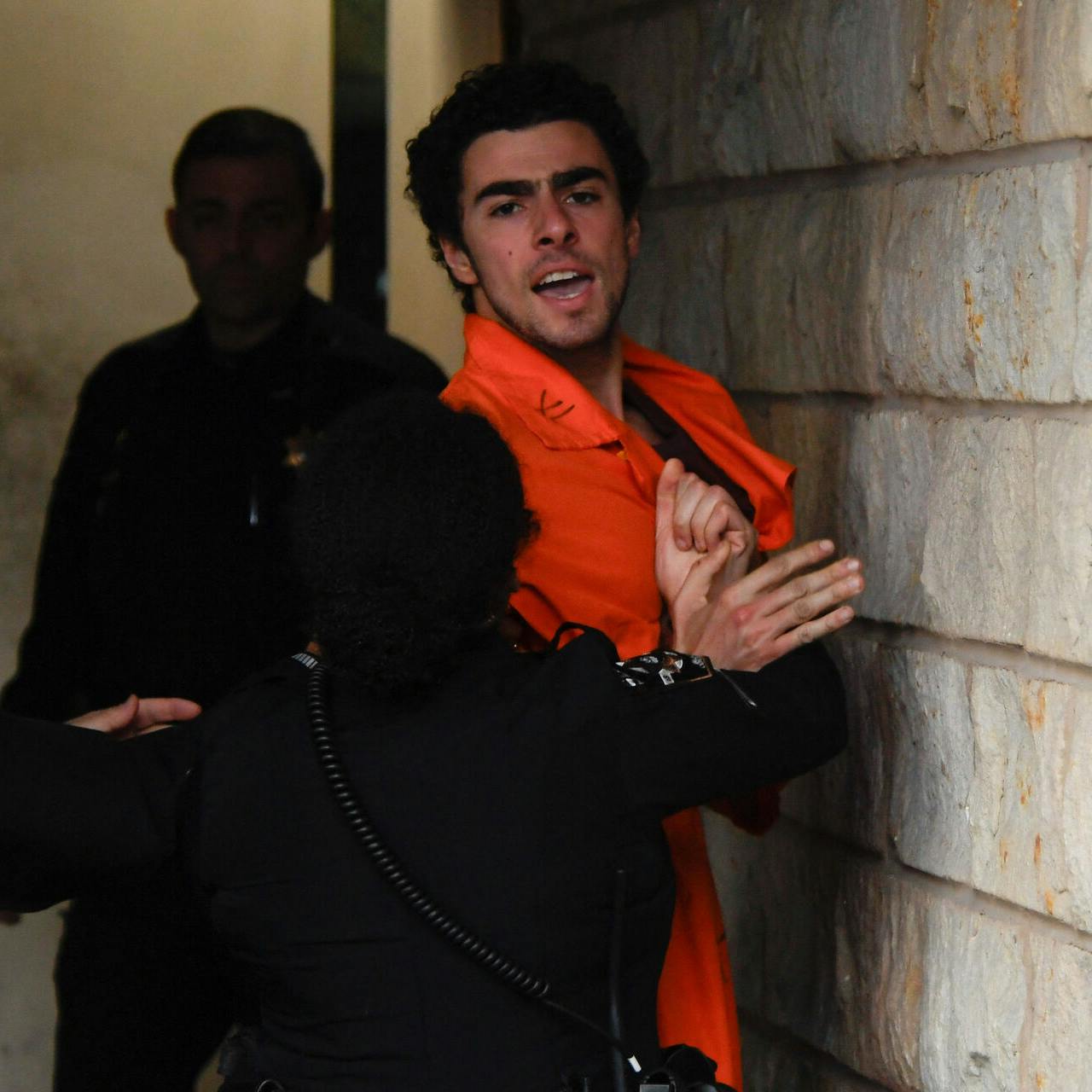 Luigi Mangione, 26, a suspect in the New York City killing of UnitedHealth executive Brian Thompson, arrives for an extradition hearing at Blair County Court House in Hollidaysburg, Pennsylvania, U.S. December 10, 2024. REUTERS/Matthew Hatcher