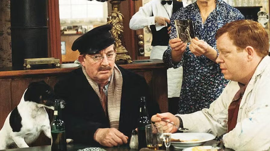 Bandit i rollen som Kvik - her sammen med sin tv-ejer, grisehandler Larsen (spillet af Buster Larsen).