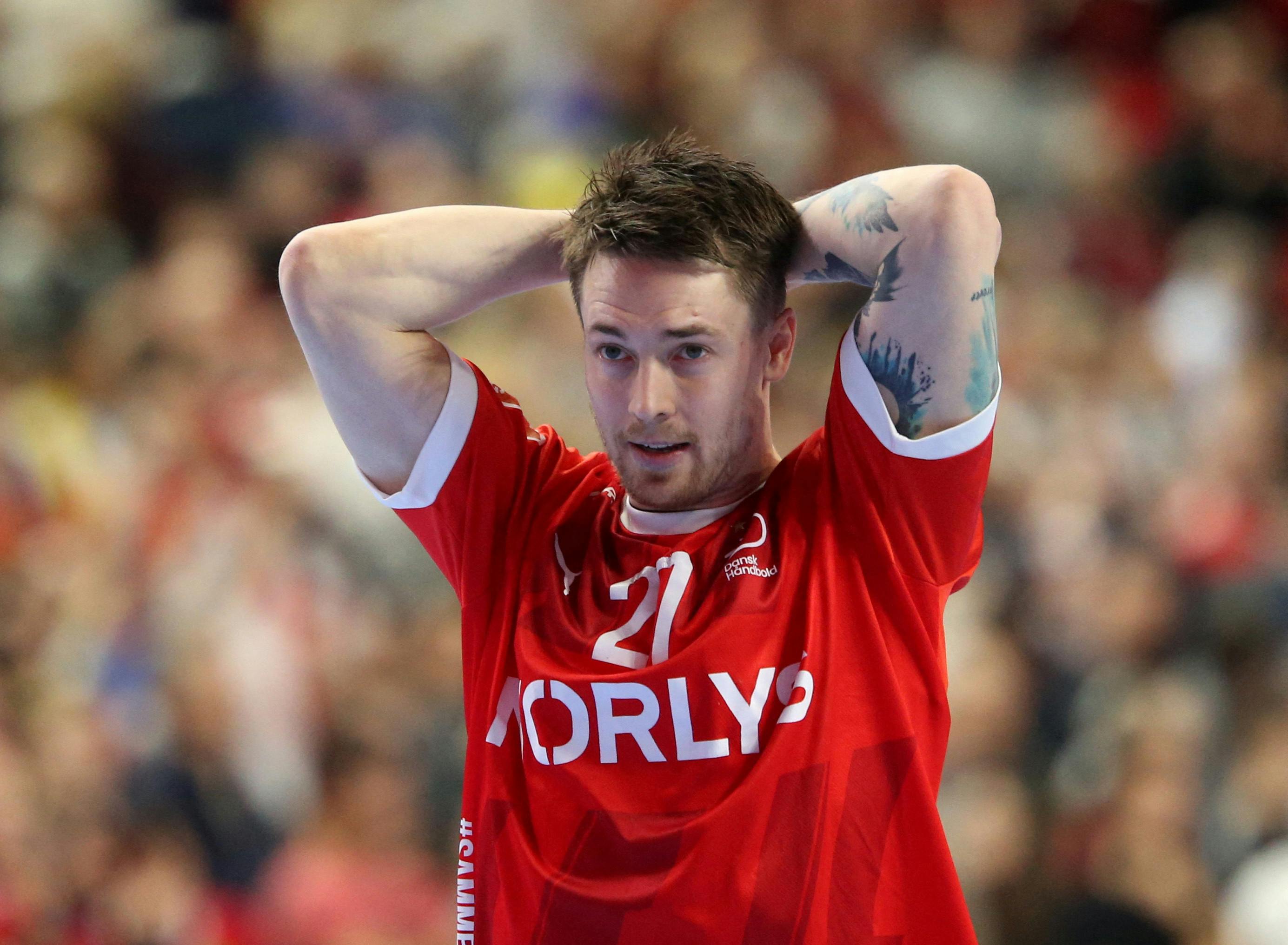 Handball - EHF 2024 Men's European Handball Championship - Final - France v Denmark - Lanxess-Arena, Cologne, Germany - January 28, 2024 Denmark's Michael Damgaard Nielsen looks dejected after the match REUTERS/Cathrin Mueller