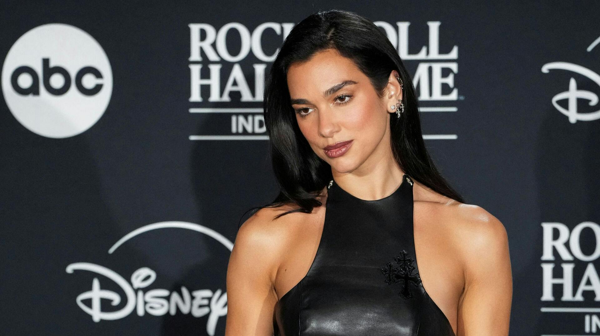 Dua Lipa meets with reporters after sharing the stage with 2024 inductees Cher, at the 2024 Rock and Roll Hall of Fame in Cleveland, Ohio, U.S. October 19, 2024. REUTERS/Ruddy Roye