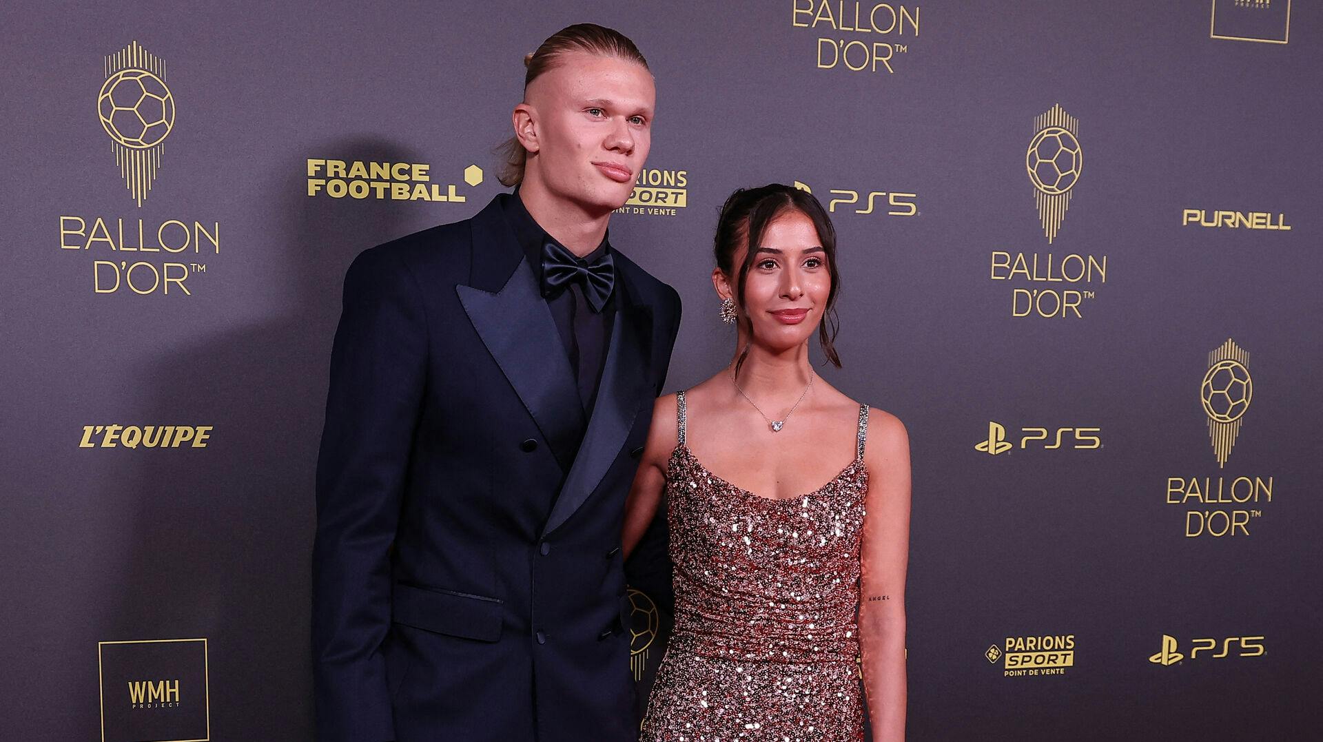 Manchester City's Norwegian forward Erling Haaland (L) and his wife Isabel Haugseng Johansen pose prior to the 2023 Ballon d'Or France Football award ceremony at the Theatre du Chatelet in Paris on October 30, 2023. FRANCK FIFE / AFP