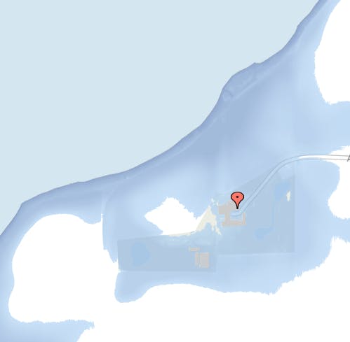 Hvis vandstanden stiger 270 cm ligger Mettes minkejendom på Møn under vand – ifølge en beregning på DinGeo. Statsministerens hus ligger ved den røde markering. De blå områder er vand.