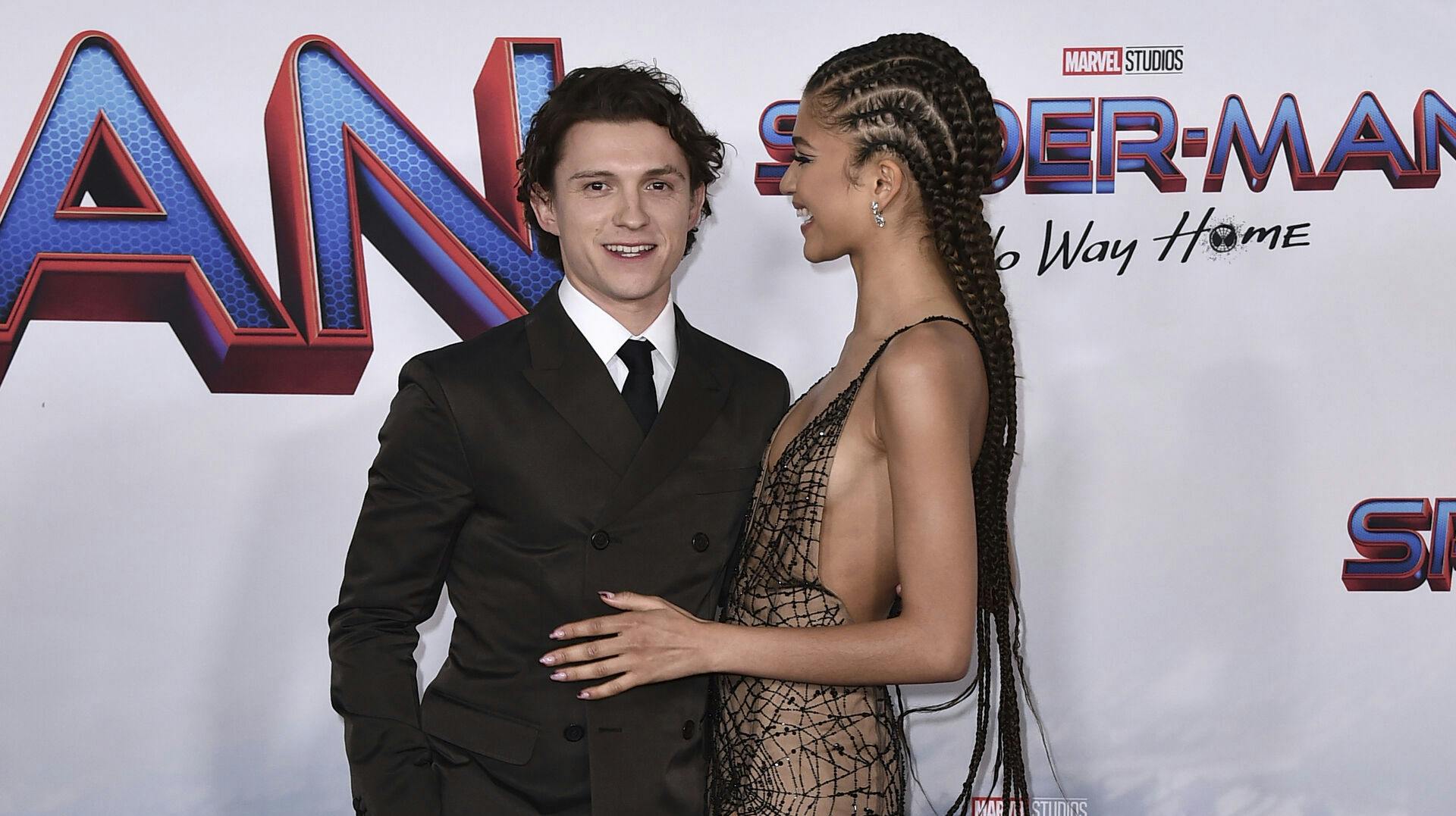 Tom Holland and Zendaya arrive at the premiere of "Spider-Man: No Way Home" at the Regency Village Theater on Monday, Dec. 13, 2021, in Los Angeles. (Photo by Jordan Strauss/Invision/AP)