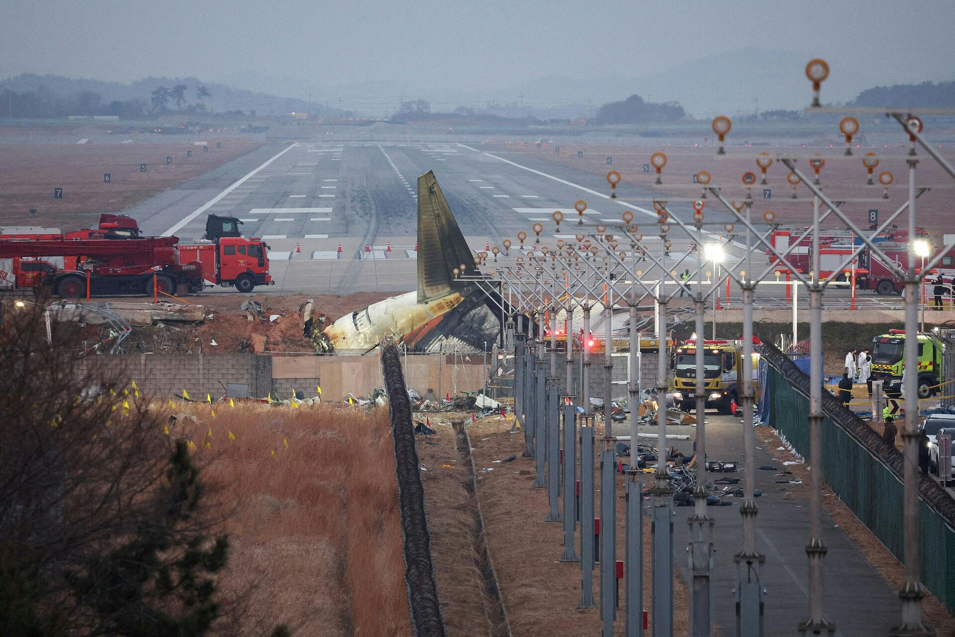 FILE PHOTO: The wreckage of the Jeju Air aircraft that went off the runway and crashed lies at Muan International Airport, in Muan, South Korea, December 30, 2024. REUTERS/Kim Hong-Ji/File Photo