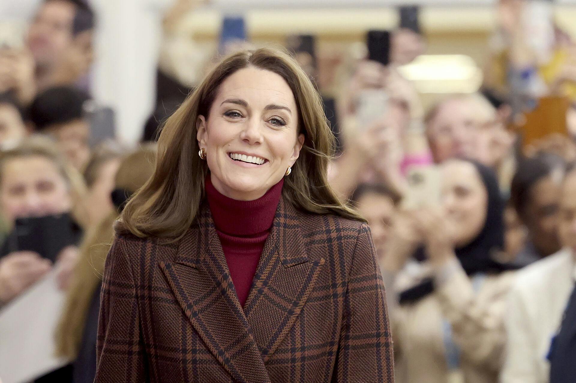 Britain's Princess Kate, center, visits The Royal Marsden Hospital, London, where she received her cancer treatment, Tuesday Jan. 14, 2025. (Chris Jackson/Pool Photo via AP)