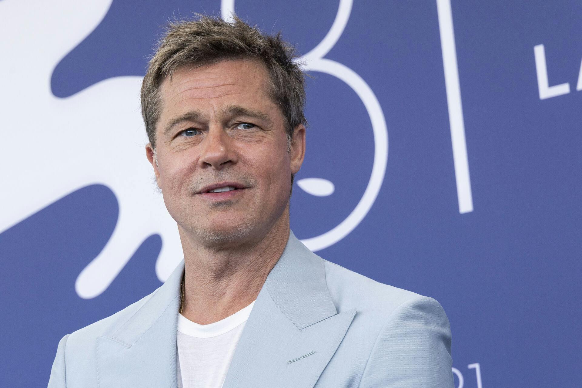 Brad Pitt poses for photographers at the photo call for the film 'Wolfs' during the 81st edition of the Venice Film Festival in Venice, Italy, on Sunday, Sept. 1, 2024. (Photo by Joel C Ryan/Invision/AP)