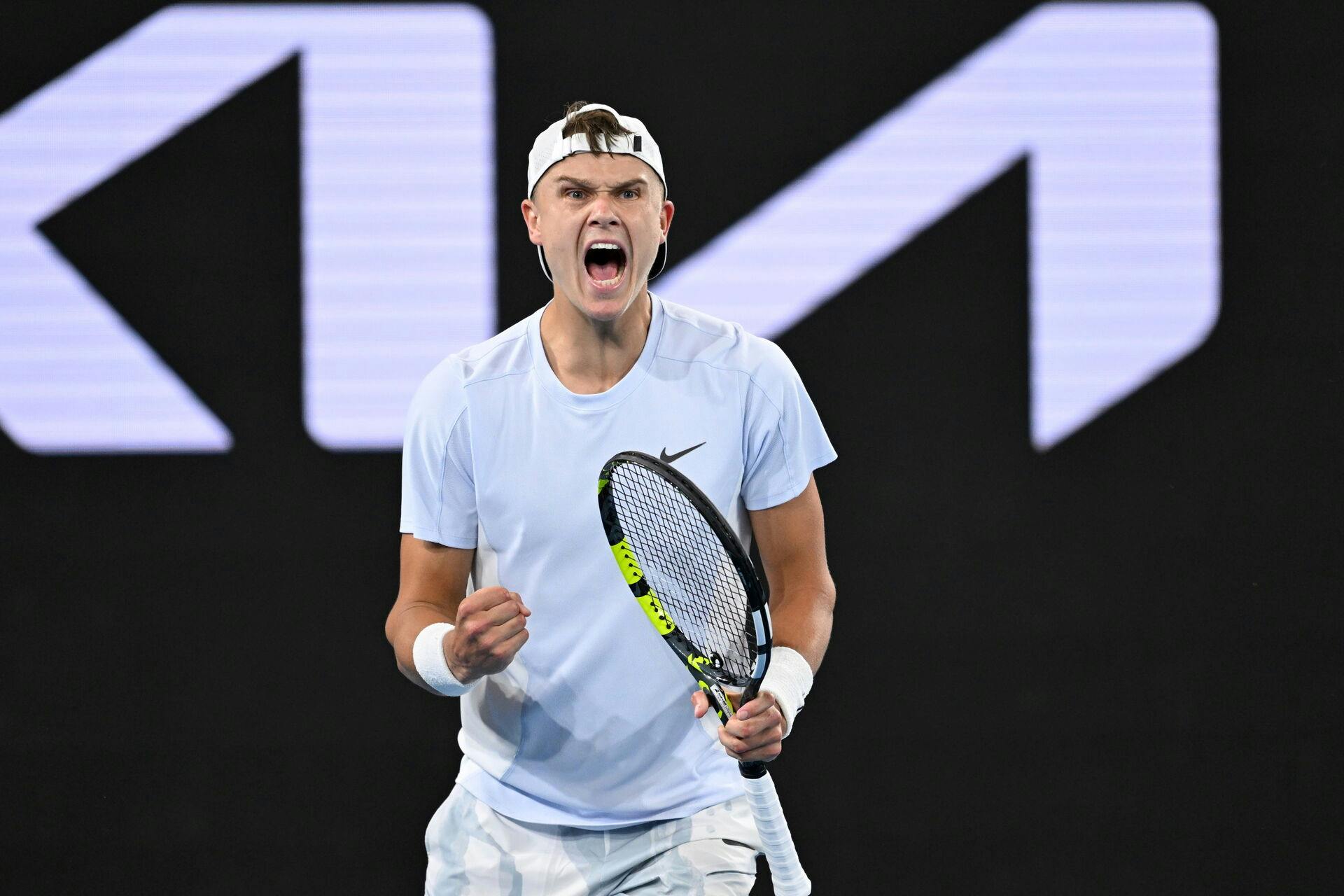 epa11833810 Holger Rune of Denmark celebrates winning the Men's Singles round 3 match against Miomir Kecmanovic of Serbia at the Australian Open tennis tournament in Melbourne, Australia, 18 January 2025. EPA/LUKAS COCH AUSTRALIA AND NEW ZEALAND OUT